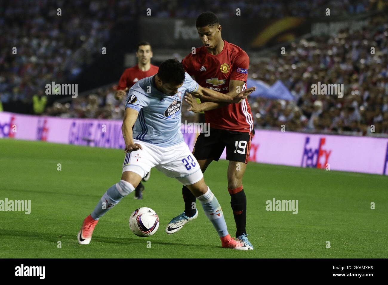 Marcus Rashford forward of Manchester United (19) battles for the ball with Gustavo Cabral defender of Celta de Vigo (22) during the UEFA Europe League Round of 2 first leg match between Celta de Vigo and Manchester United at Balaidos Stadium on May 4, 2017 in Vigo, Spain. (Photo by Jose Manuel Alvarez Rey/NurPhoto) *** Please Use Credit from Credit Field *** Stock Photo