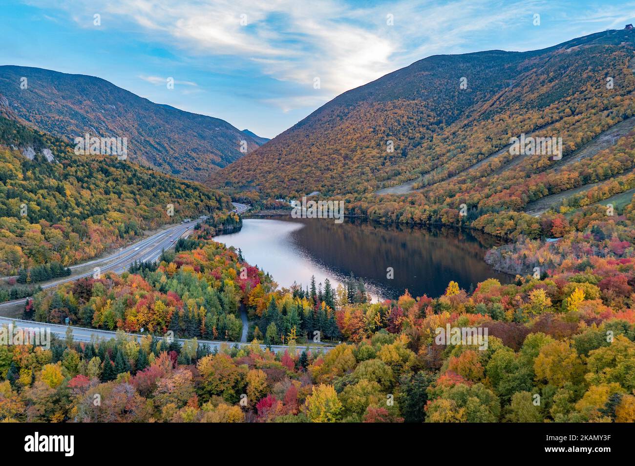 A beautiful shot of Echo lake and colorful fall foliage in Franconia