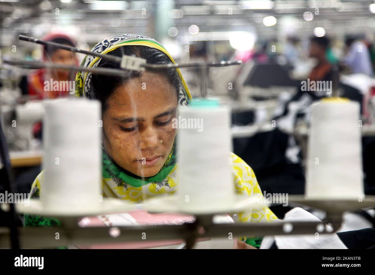 Garments worker working inside a factory in Gazipur in Bangladesh, on