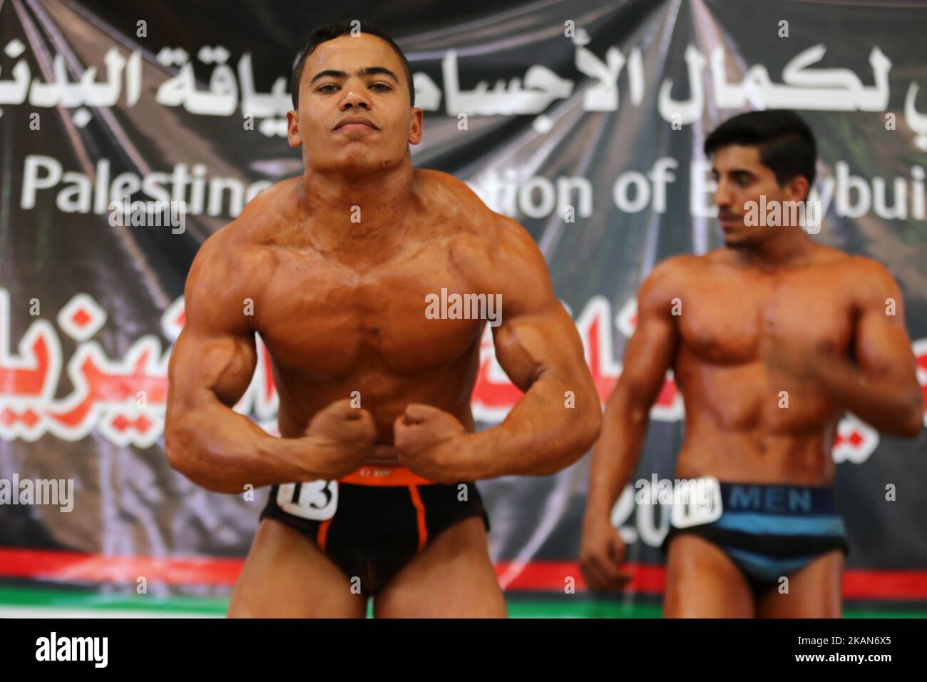 Gaza Bodybuilder Palestinian men flex their muscles as they compete during a Gaza Strip ...