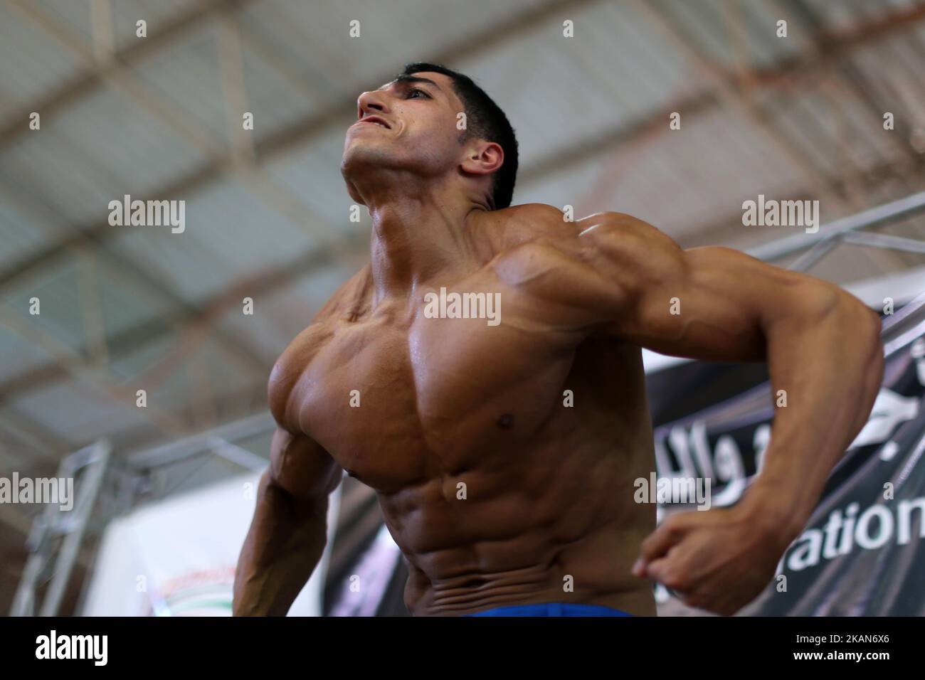 Gaza Bodybuilder Palestinian men flex their muscles as they compete during a Gaza Strip ...