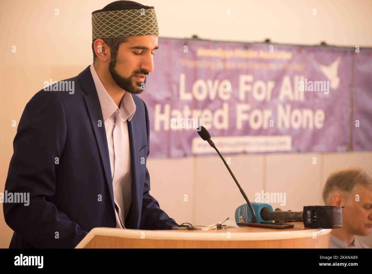 Galib Khan recites a passage from The Holy Quran during a prayer service at the Darul Aman Mosque, for the victims of the Manchester Arena explosion, in Manchester, United Kingdom on Friday, May 26th, 2017. Greater Manchester Police are treating the explosion after the Ariana Grande concert, which took place on 05/22/2017 at Manchester Arena, as a terrorist incident. (Photo by Jonathan Nicholson/NurPhoto) *** Please Use Credit from Credit Field *** Stock Photo