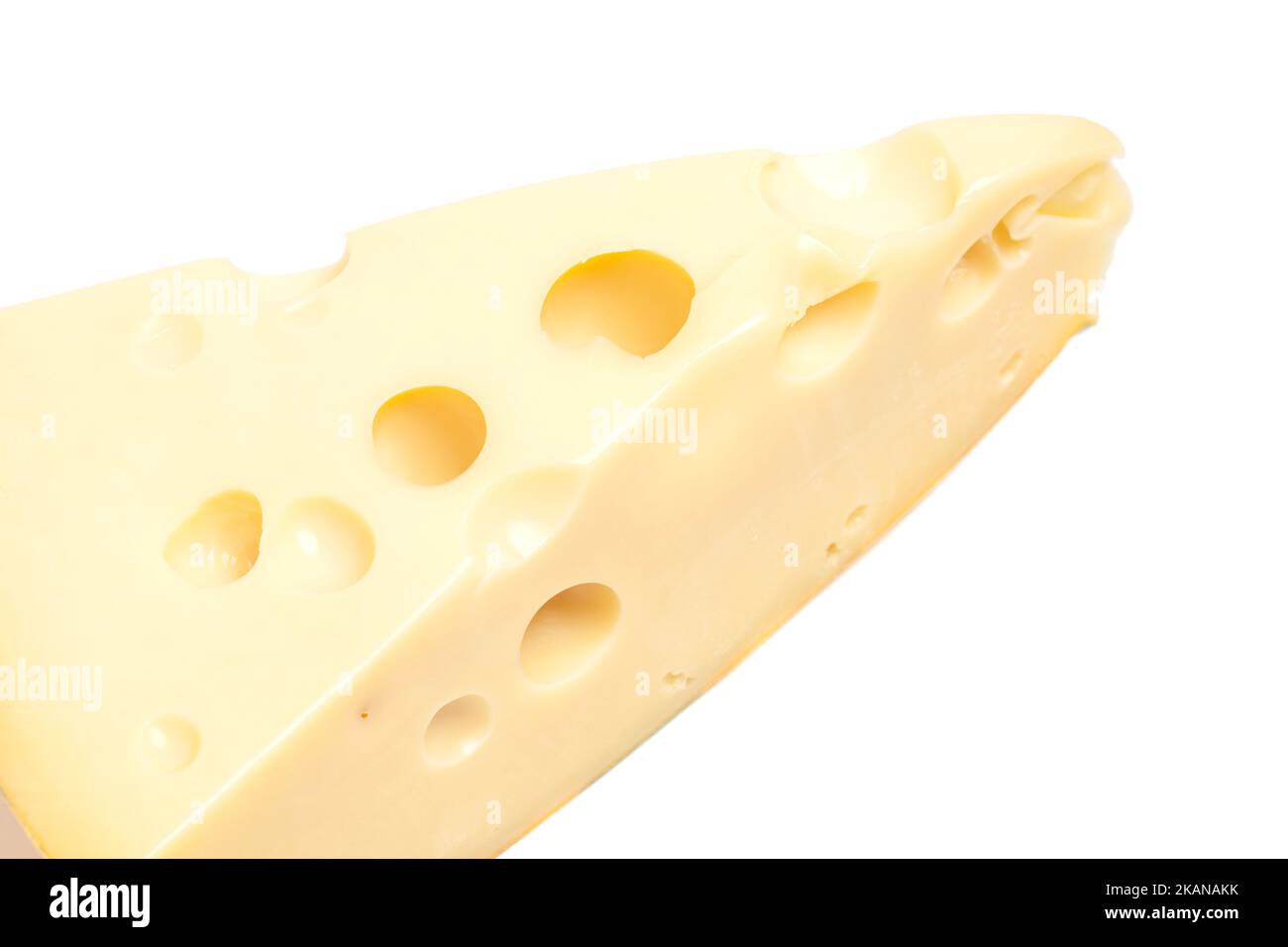 Piece of cheese with big holes, isolated on white background Stock