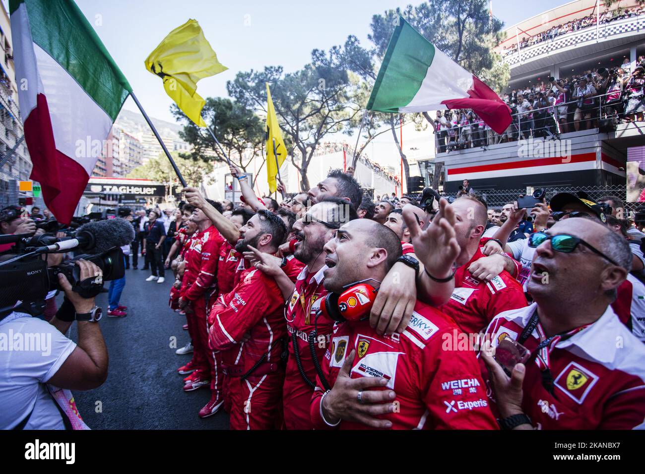 Ferrari team members celebrating the victory during the Monaco Grand