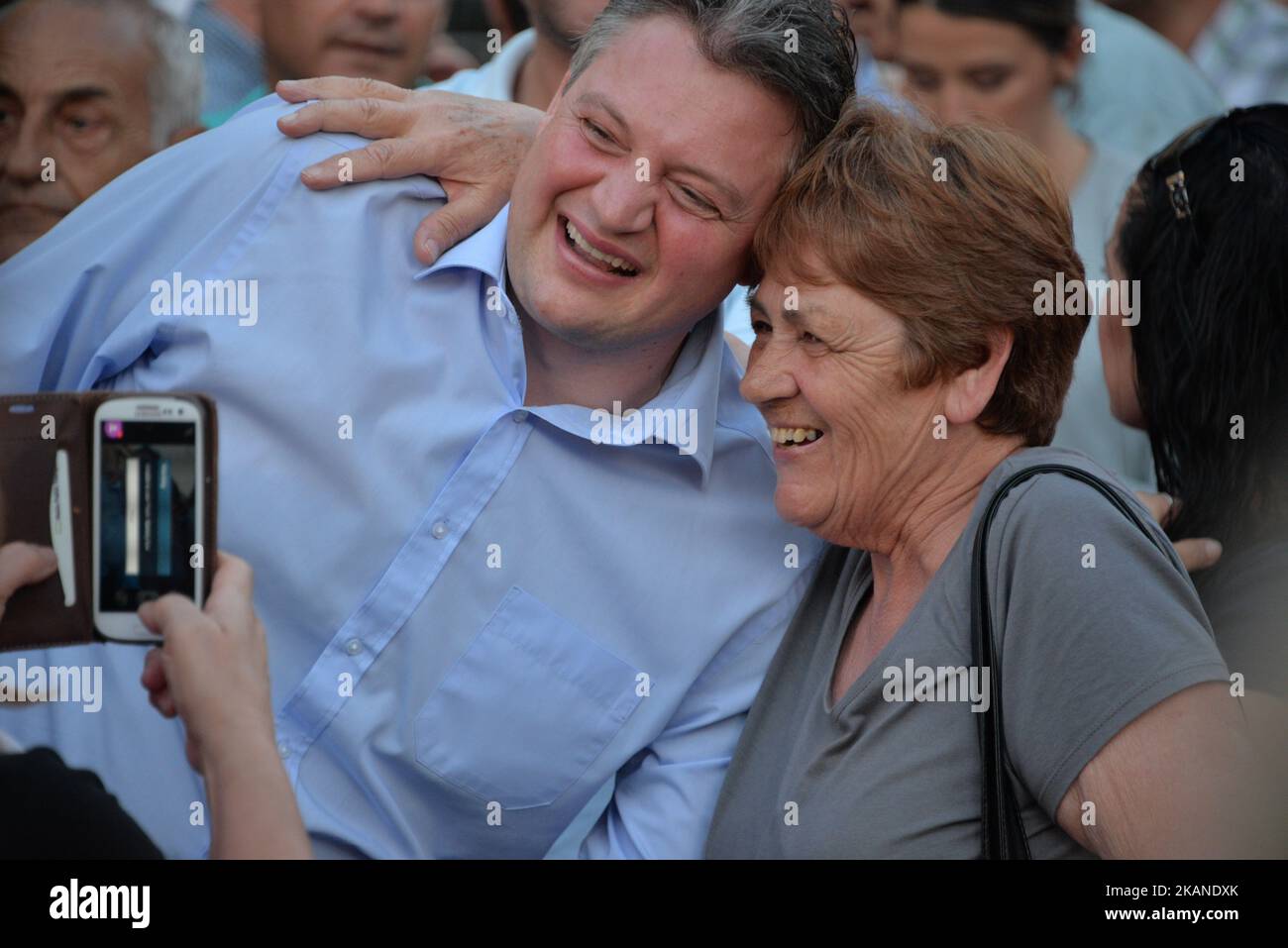 Minister Without Portfolio, Konrad Mizzi (left) poses for a photograph with a supporter before a campaign rally for the re-election of Labour Prime Minister Joseph Muscat in Paola, Malta on Wednesday, May 24, 2017. Mizzi lost his position as Energy and Health Minister after the Panama Papers leaks revealed Mizzi established an overseas shell company in Panama in 2014. (Photo by Kendall Gilbert/NurPhoto) *** Please Use Credit from Credit Field *** Stock Photo