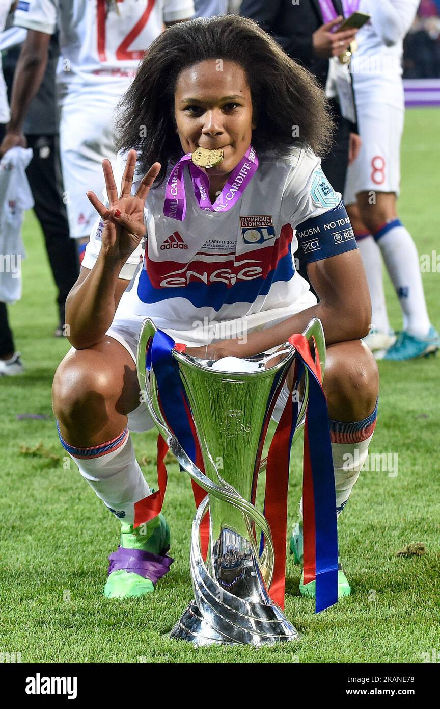 Wendie Renard(captain) of Olympique Lyon celebrates with the Champions  League trophy during the UEFA Women's Champions League Final between Lyon  Women and Paris Saint Germain Women at the Cardiff City Stadium, Cardiff,