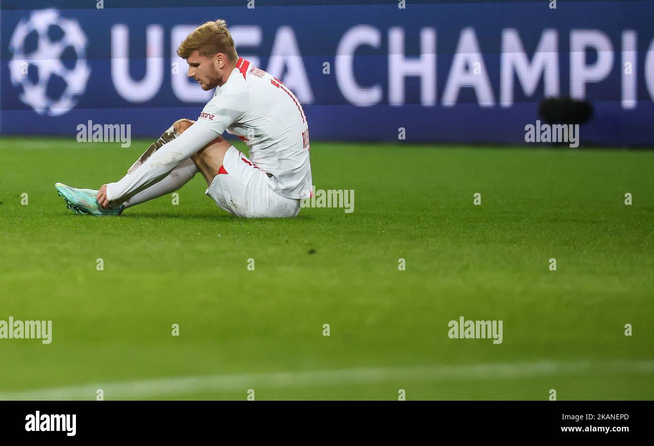 02 November 2022, Poland, Warschau: Soccer: Champions League, Group stage, Group F, Matchday 6 Shakhtyor Donetsk - RB Leipzig at Wojska Polskiego Stadion. Leipzig's player Timo Werner holds his ankle after a foul. Photo: Jan Woitas/dpa Stock Photo