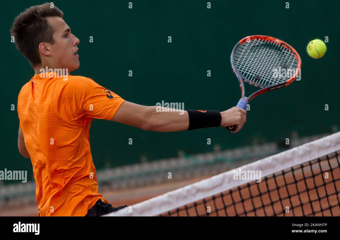 Zsombor Piros of Hungary returns the ball to Simon Carr of Irland during  the boys 2nd round at Roland Garros Grand Slam Tournament - Day 9 on June  5, 2017 in Paris,
