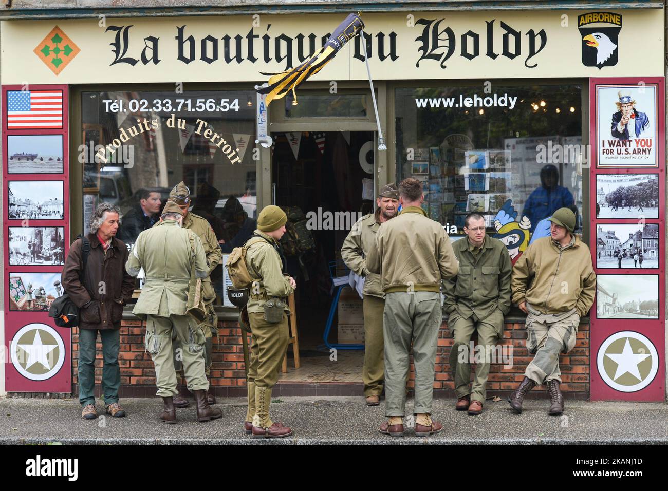 People take a stop in St Marie Du Mont ahead of the International