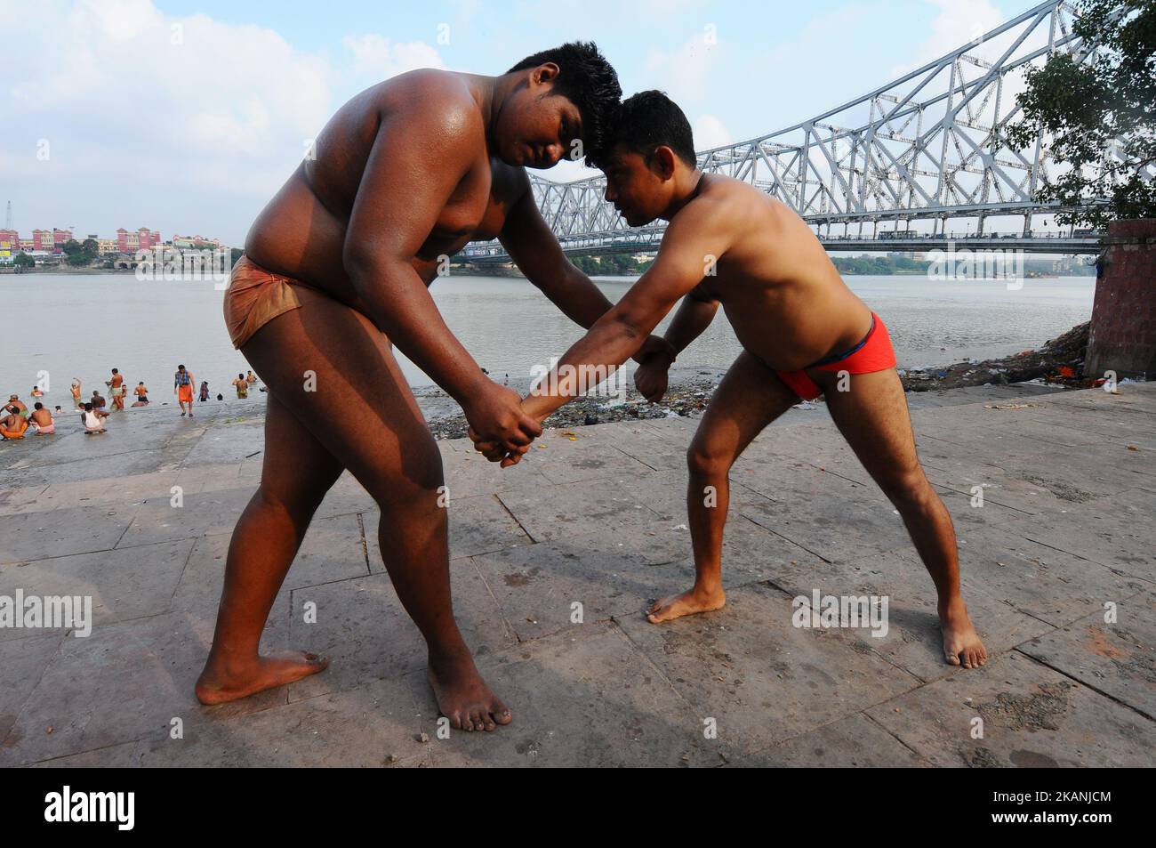 Wrestlers exercise at a traditional Indian wrestling training center on the banks of the river Ganges ahead of the Bengal mud wrestling championships in India ,June 07,2017. (Photo by Debajyoti Chakraborty/NurPhoto) *** Please Use Credit from Credit Field *** Stock Photo