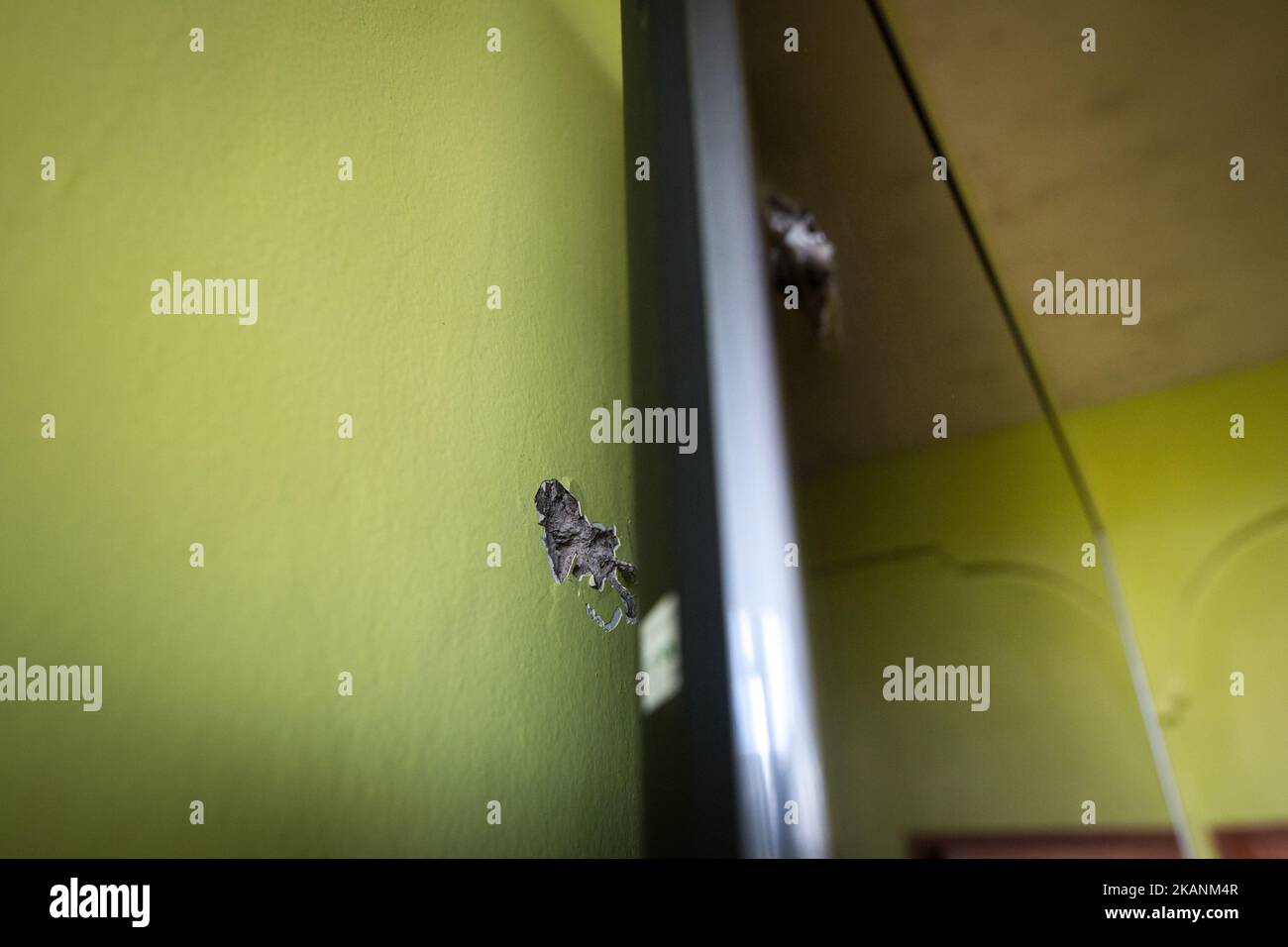 A stray bullet came inside of a resident's television wall fired by ISIS-Maute sniper 50 caliber gun during a heavy fight in Marawi city, southern Philippines on June 11, 2017. Philippine military jets fired rockets at militant positions on Sunday as soldiers fought to wrest control of the southern city from gunmen linked to the Islamic State group. (Photo by Richard Atrero de Guzman/NurPhoto) *** Please Use Credit from Credit Field *** Stock Photo