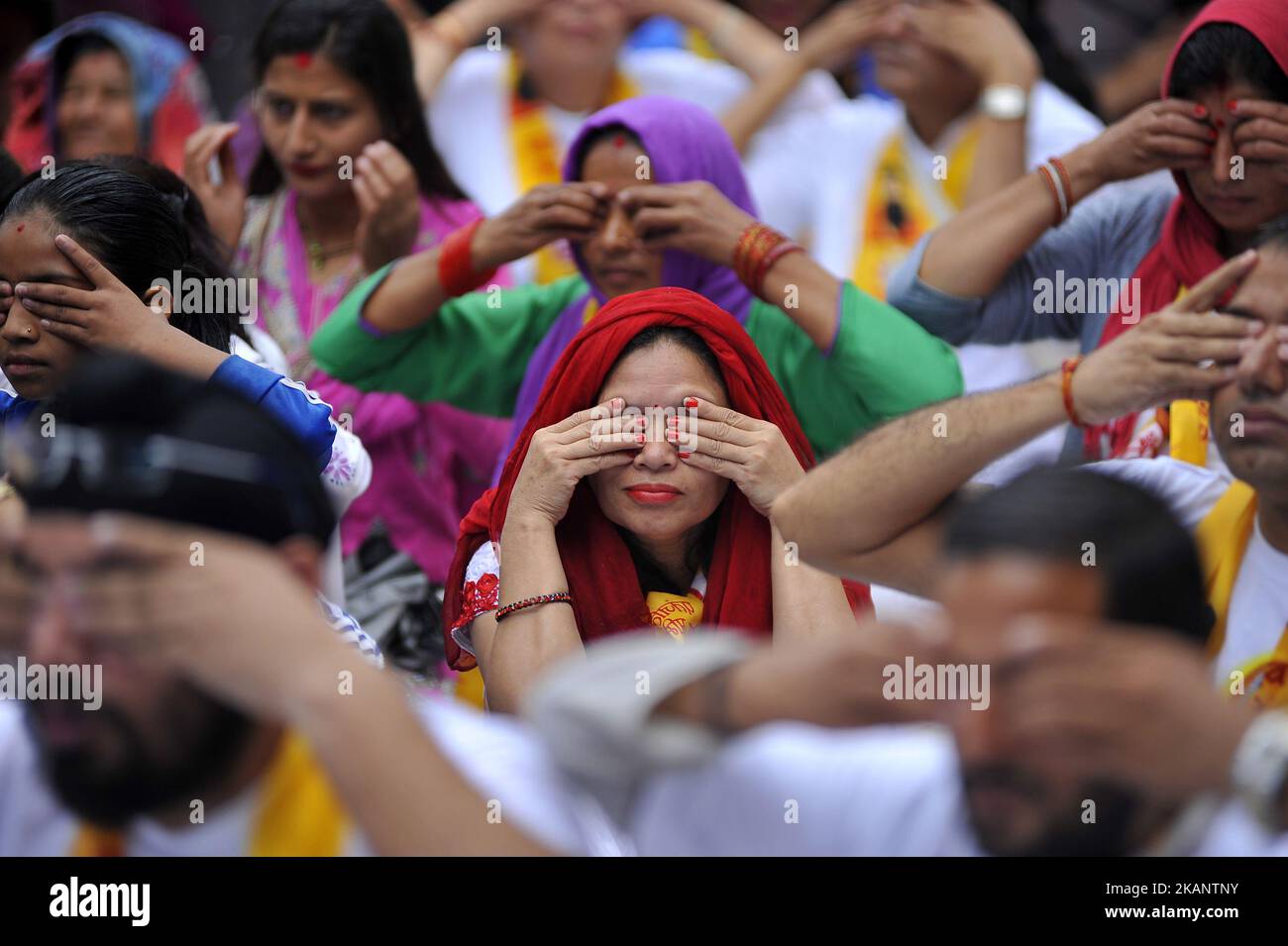 Nepalese yoga enthusiast people performing Yoga Position during the celebration of International Day of Yoga at Kathmandu, Nepal on Wednesday, June 21, 2017. (Photo by Narayan Maharjan/NurPhoto) *** Please Use Credit from Credit Field *** Stock Photo