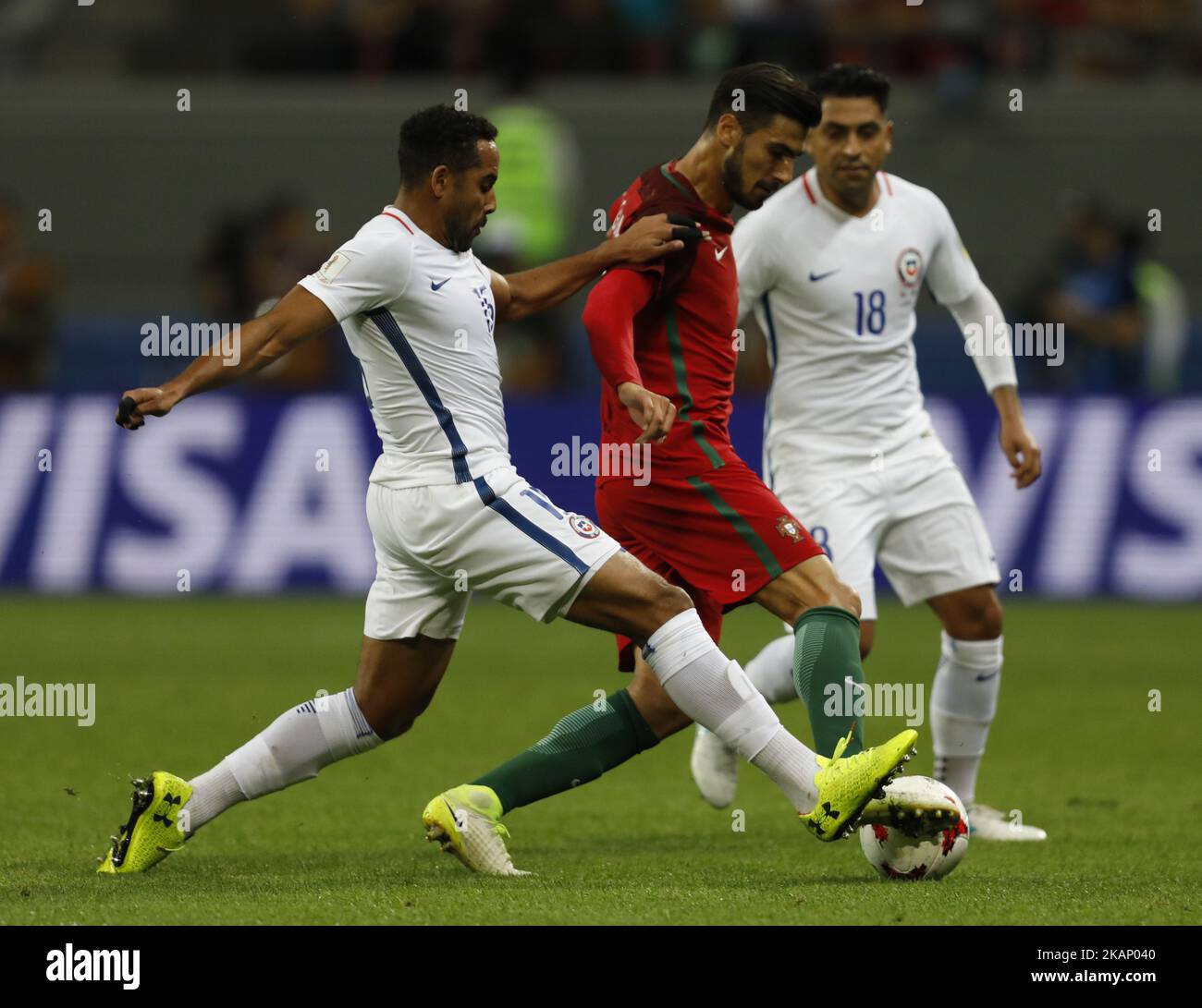 Andre Gomes (C) of Portugal national team vies for the ball with Jean Beausejour (L) of Chile national team and Gonzalo Jara of Chile national team during FIFA Confederations Cup Russia 2017 semi-final match between Portugal and Chile at Kazan Arena in June 28, 2017 in Kazan, Russia. (Photo by Mike Kireev/NurPhoto) *** Please Use Credit from Credit Field *** Stock Photo