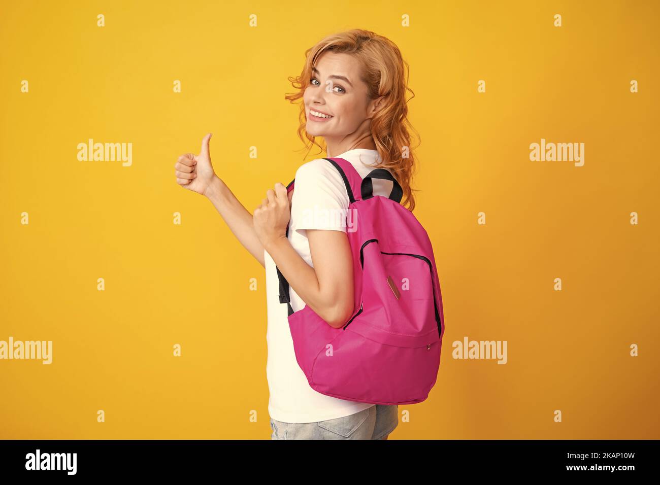 Portrait of smiling female student with books. Happy girl with a ...