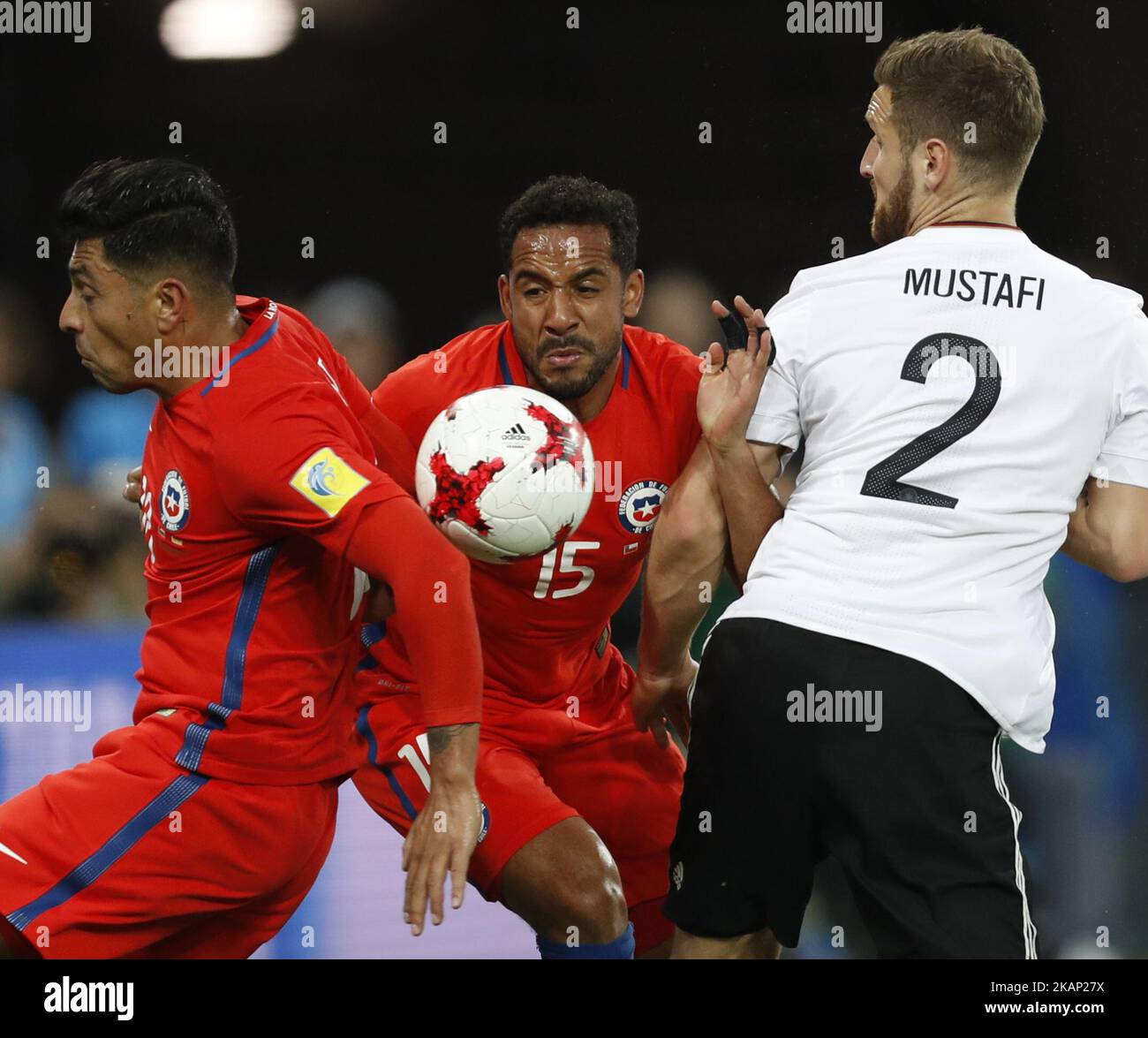 (L to R) Gonzalo Jara of Chile national team, Jean Beausejour of Chile national team and Shkodran Mustafi of Germany national team during FIFA Confederations Cup Russia 2017 final match between Chile and Germany at Saint Petersburg Stadium on July 2, 2017 in Saint Petersburg, Russia. (Photo by Mike Kireev/NurPhoto) *** Please Use Credit from Credit Field *** Stock Photo