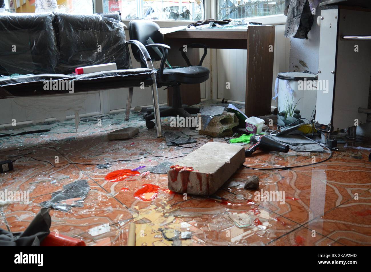An Iraqi barber shop is seen heavily damaged after a conflict between Turkish citizens and Syrian refugees at Demetevler neighbourhood in Ankara, Turkey on July 04, 2017. In the last hours of July 03, a group of Syrian refugees conflicted with local residents as the police dispersed the two groups with water cannon vehicles and gas bombs at the neighbourhood. After the conflict, the residents took to the streets to protest against the Turkish government's refugee policy. As a result of the conflict, a person was injured, and numerous workplaces in the neighbourhood were damaged. (Photo by Alta Stock Photo
