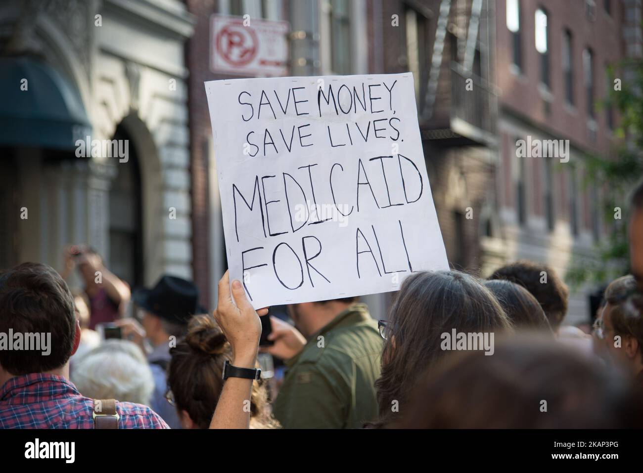 A small group of activists rally against the GOP health care plan outside of the Metropolitan Republican Club, July 5, 2017 in New York City. Republicans in the Senate will resume work on the bill next week when Congress returns to Washington after a holiday recess. (Photo by Zach D Roberts/NurPhoto) *** Please Use Credit from Credit Field *** Stock Photo