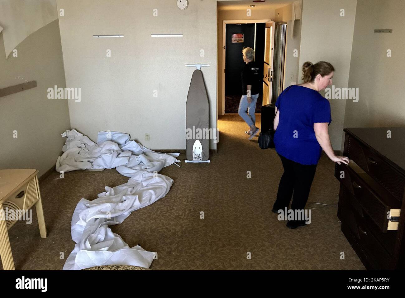 Members of the public browse hallways and some of the 1250 rooms during a large scale liquidation sale at the former Trump Taj Mahal Casino and resort, in Atlantic City, on July 8, 2017. The property recently changed hands for $50 million and will be redeveloped in a Hard Rock Cafe owned resort. (Photo by Bastiaan Slabbers/NurPhoto) *** Please Use Credit from Credit Field *** Stock Photo