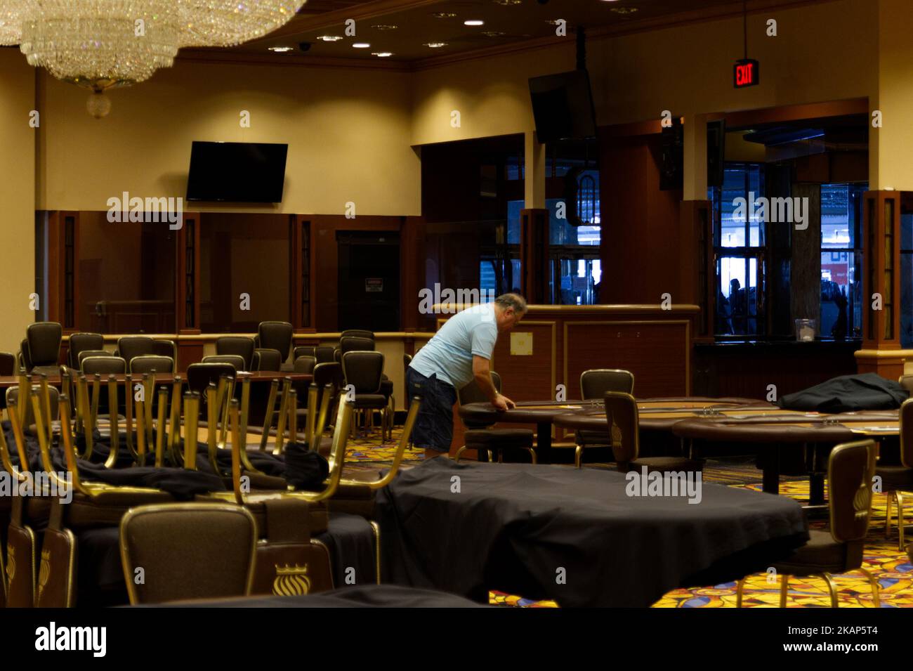 Poker tables and chairs are up for sale as members of the public browse the inventory of the closed Trump Taj Mahal Casino and resort during a large scale liquidation sale, on July 8, 2017, in Atlantic City, NJ. The property recently changed hands for $50 million and will be redeveloped in a Hard Rock Cafe owned resort. (Photo by Bastiaan Slabbers/NurPhoto) *** Please Use Credit from Credit Field *** Stock Photo