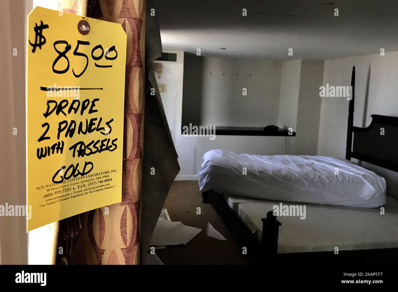 Price tags hang from sheer curtains at the 49th floor of the former Trump Taj Mahal Casino and Resort, during the liquidation sale, on July 8, 2017, in Atlantic City, New Jersey. The property recently changed hands for $50 million and will be redeveloped in a Hard Rock Cafe owned resort. (Photo by Bastiaan Slabbers/NurPhoto) *** Please Use Credit from Credit Field *** Stock Photo