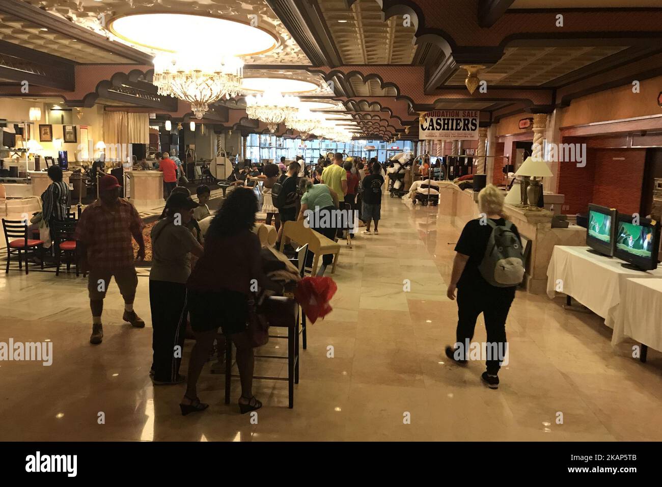 Members of the public check out after purchasing items during the third day of a liquidation sale at the former Trump Taj Mahal Casino and Resort in Atlantic City, New Jersey, on July 8, 2017. The property recently changed hands for $50 million and will be redeveloped in a Hard Rock Cafe owned resort. (Photo by Bastiaan Slabbers/NurPhoto) *** Please Use Credit from Credit Field *** Stock Photo