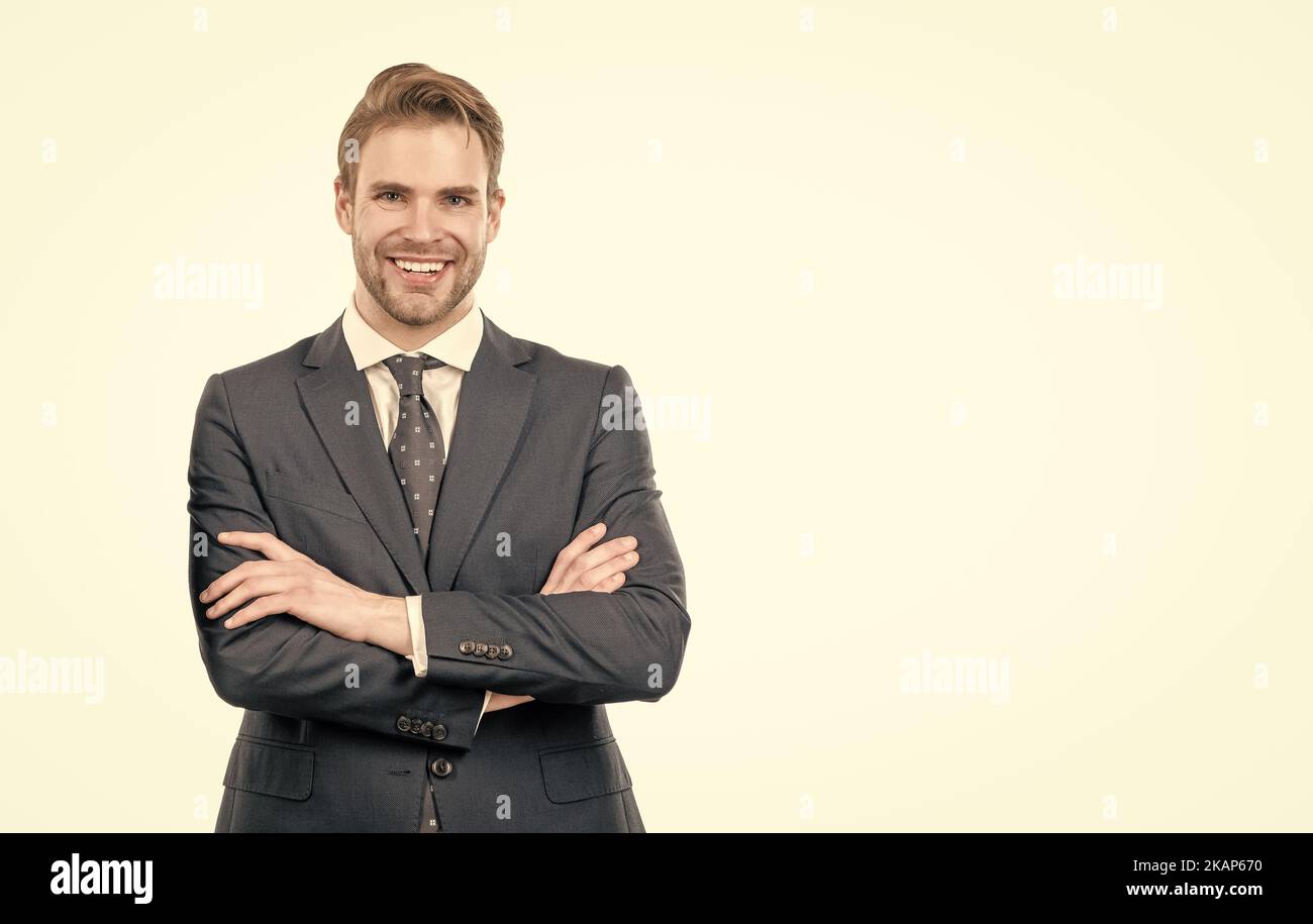 Im young professional. Confident professional employee. Happy man keep arms crossed Stock Photo