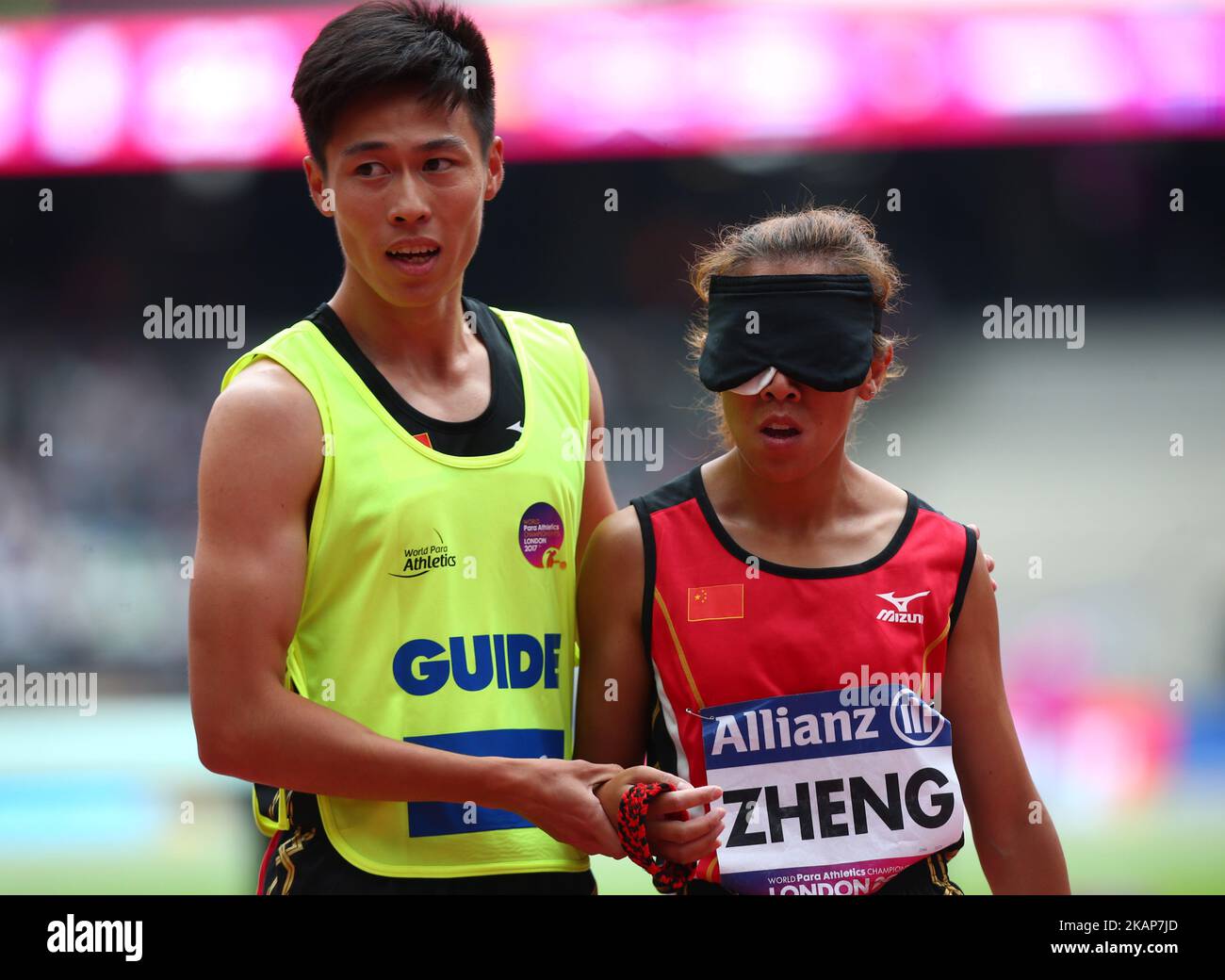 Jin Zheng 0f China and Guide Zipeng Wang Women's 1500m T11 Round 1 Heat ...