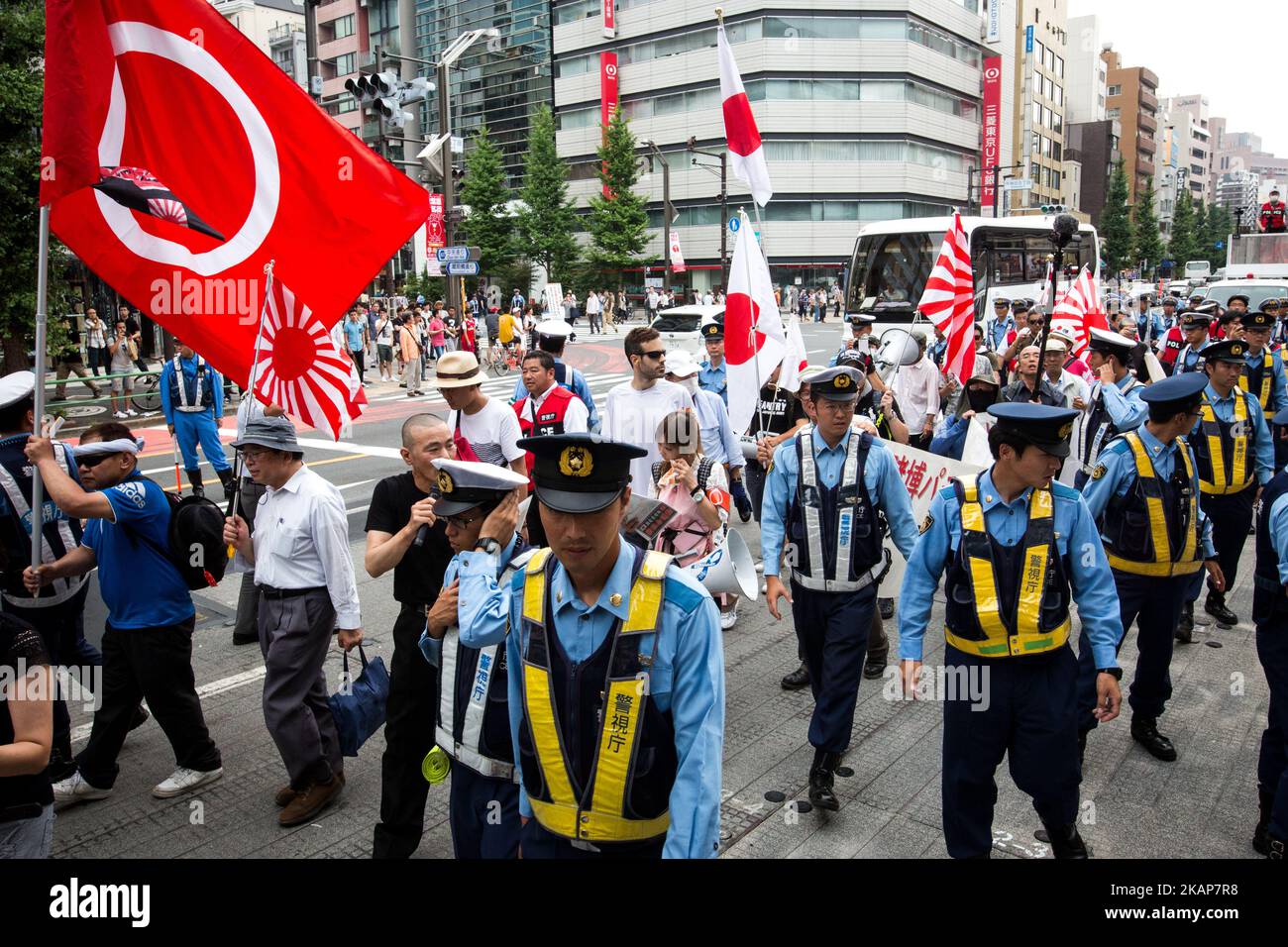 Japanese nationalists holding Japanese flags took to the streets in a 'hate demonstration' in Akihabara, Tokyo, Japan on July 16, 2017. The nationalists faced off with anti-racist groups who mounted counter protests demanding an end to hate speech and racism in Japan. (Photo by Richard Atrero de Guzman/NUR Photo) *** Please Use Credit from Credit Field *** Stock Photo