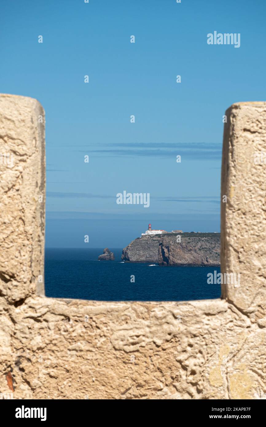 A frame in frame photo of the lighthouse on Cabo de Sao Vicente, Cape Saint Vincent, situated on a rocky peninsula on the southwestern-most corner of Stock Photo