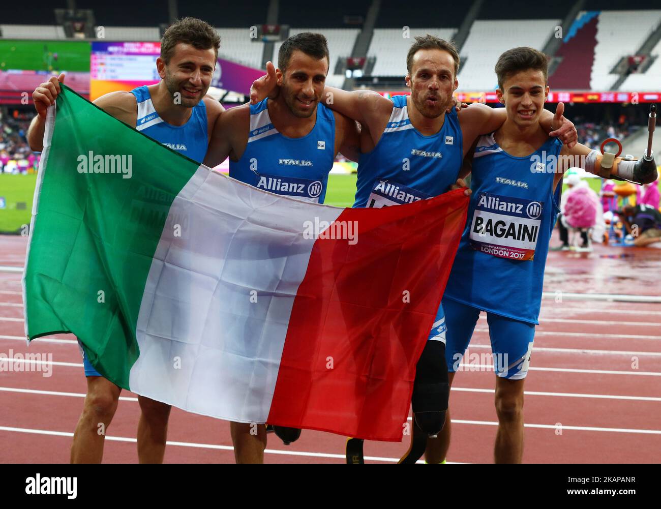 Italy Team Celebrates Winning The Silver Medal Men s 4 X 100m Relay T42 italy-team-celebrates-winning-the-silver-medal-men-s-4-x-100m-relay-t42