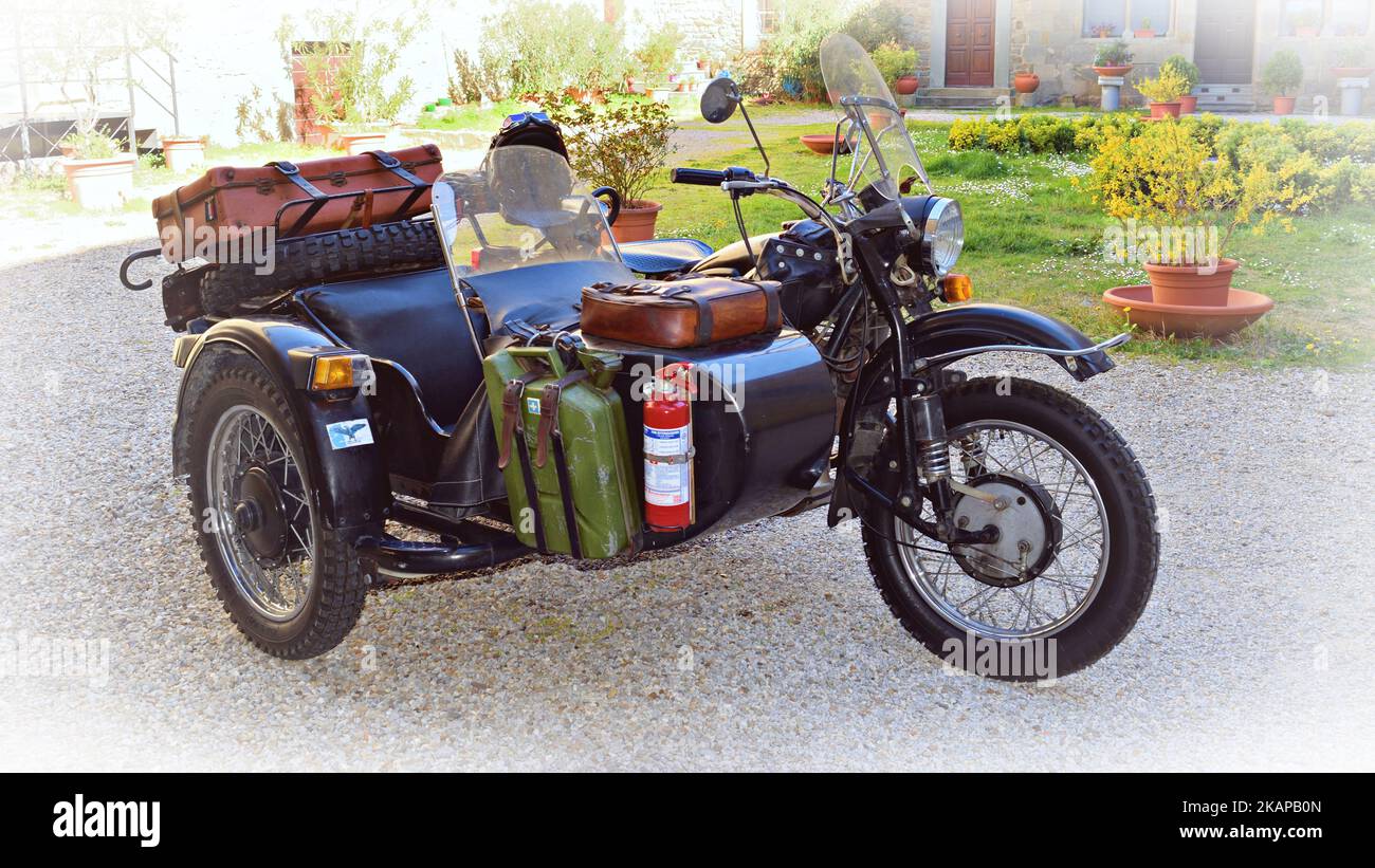 vintage IMZ-Ural motorcycle with sidecar produced by the Russian company of the Soviet Union Stock Photo