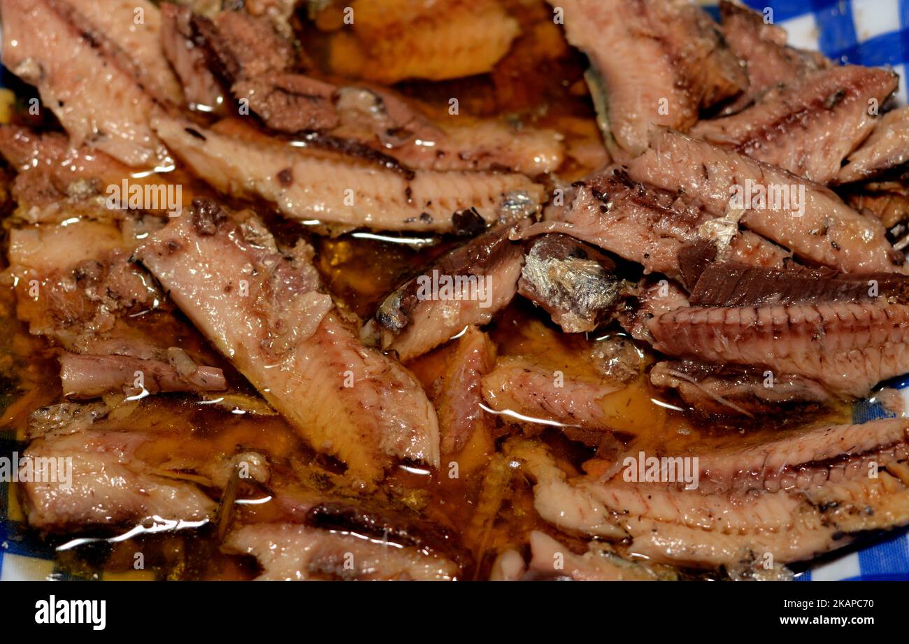 A plate of seafood cuisine of canned sardines prepared with olive oil