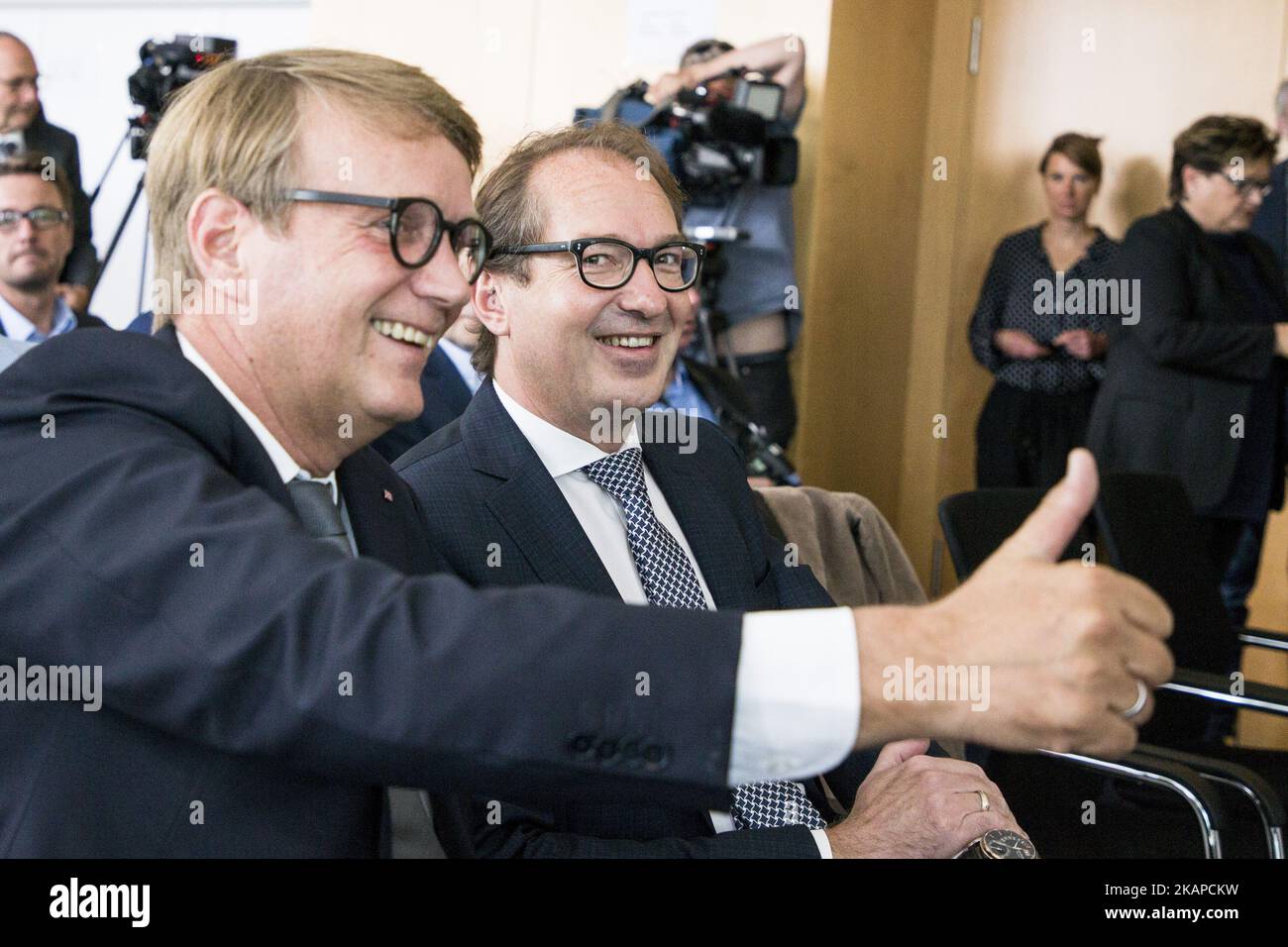 German Transport Minister Alexander Dobrindt (R) and Deutsche Bahn (DB, German Railways) Infrastructure Manager Ronald Pofalla (L) gesture for the photographers prior to a news conference regarding the future opening of the high speed connection Berlin - Munich at the DB headquarters in Berlin, Germany on July 28, 2017. (Photo by Emmanuele Contini/NurPhoto) *** Please Use Credit from Credit Field *** Stock Photo