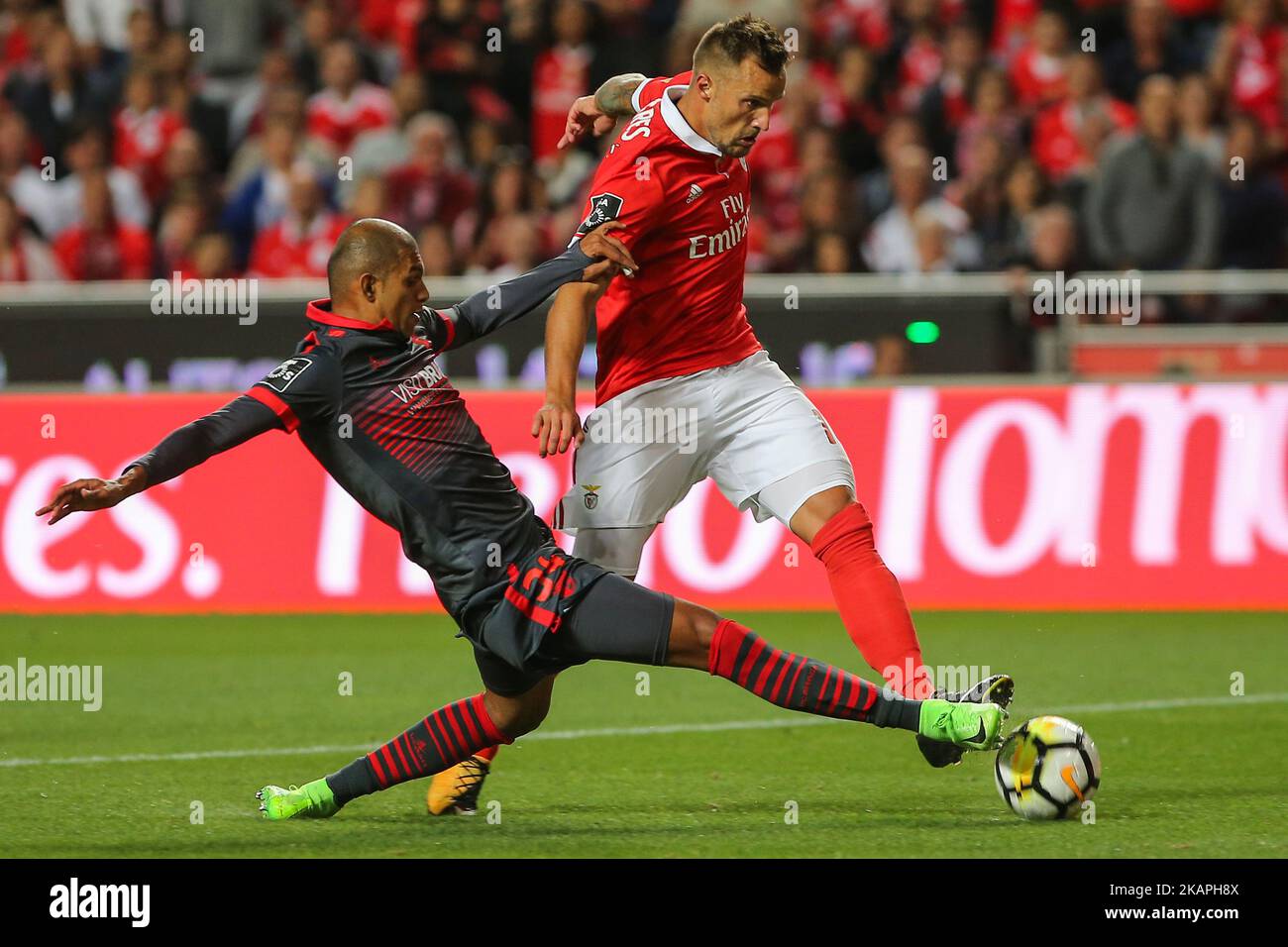 Benficas forward Haris Seferovic from Switzerland (R) and Bragas defender Raul Silva from Brazil (L) during the Premier League 2017/18 match between SL Benfica v SC Braga, at Luz Stadium in Lisbon on August 9, 2017. (Photo by Bruno Barros / DPI / NurPhoto) *** Please Use Credit from Credit Field *** Stock Photo