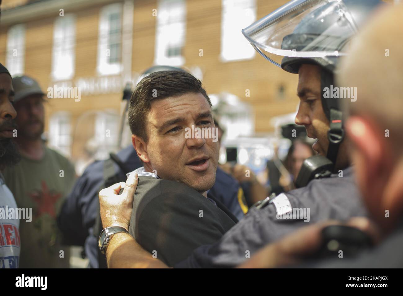Jason Kessler was forcibly removed by State Police in Charlottesville, Virginia on August 13, 2017. Jason Kessler, one of the main organizers for the Unite The Right Rally held this weekend in Charlottesville, attempted to hold a press conference to counter the events of Saturday. The conference last about 3 minutes before Kessler was evacuated by Virginia State Police. (Photo by Shay Horse/NurPhoto) *** Please Use Credit from Credit Field *** Stock Photo