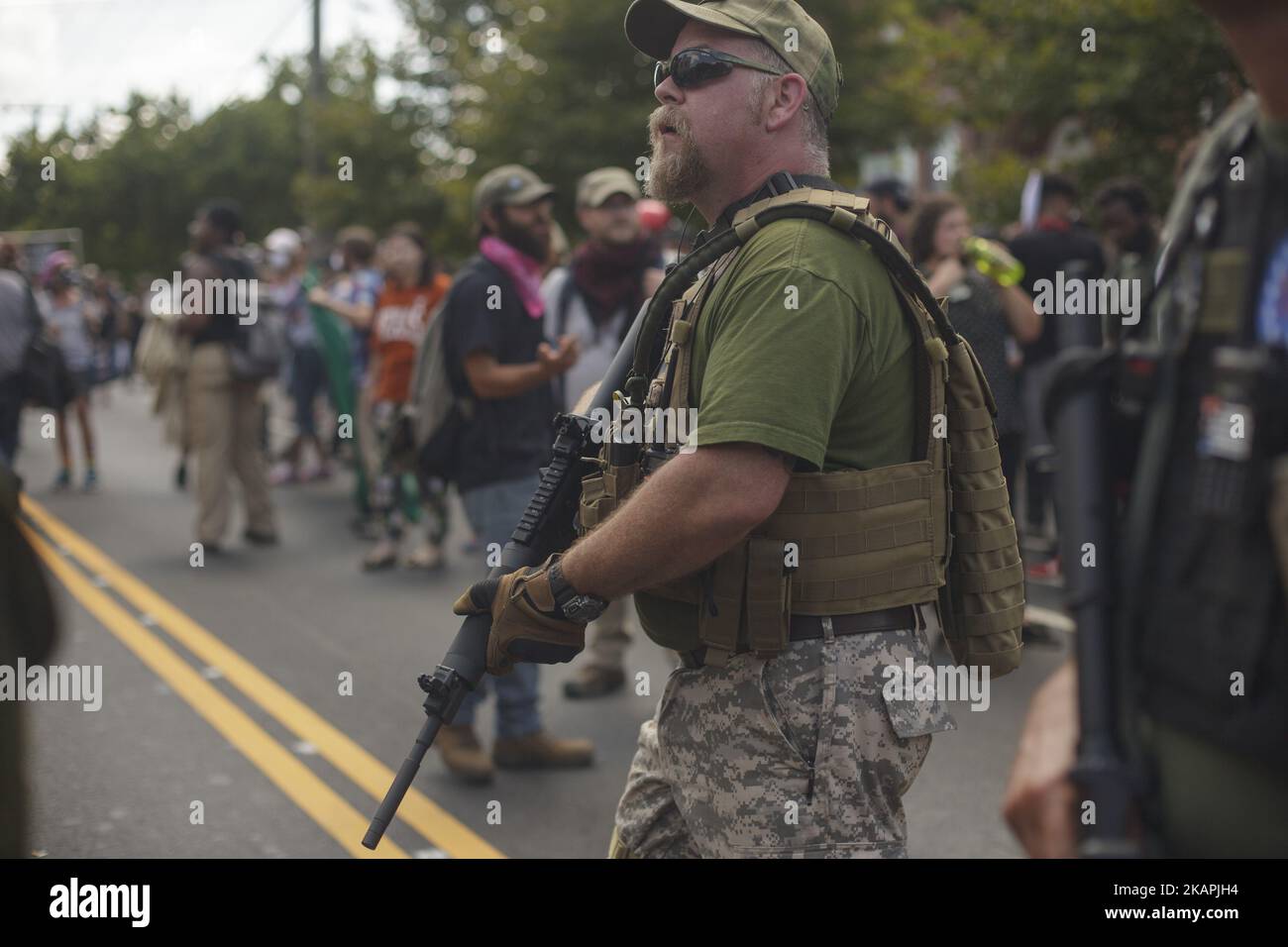 There were dozens of protesters with large rifles present at the Unite The Right rally on August 12, 2017 in Charlottesville, Virginia, USA. The White Supremacists/Alt Right supporters were forcibly removed by police. (Photo by Shay Horse/NurPhoto) *** Please Use Credit from Credit Field *** Stock Photo