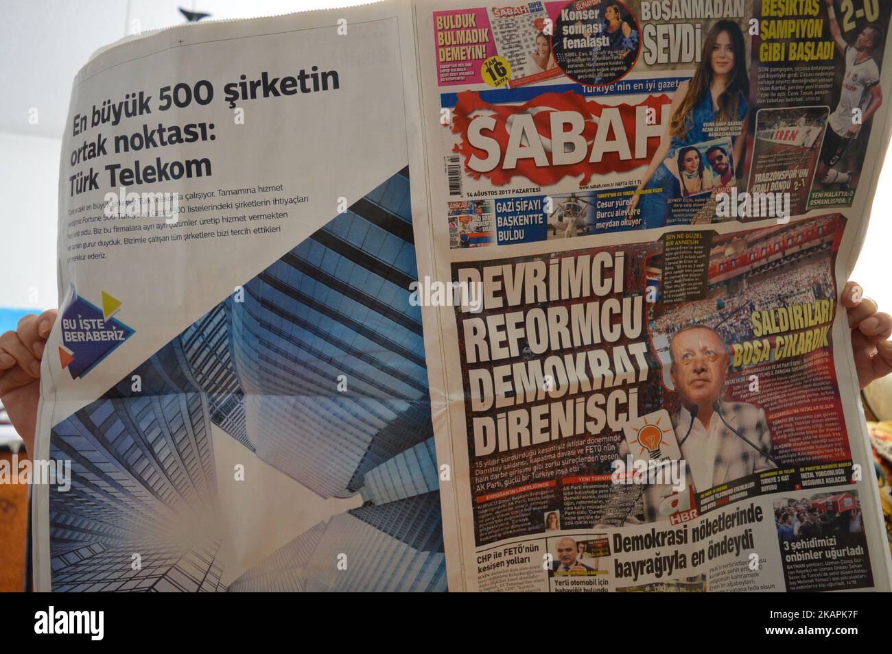 Sabah, a Turkish pro-government daily newspaper, marks the ruling Justice and Development Party's (AKP) 16th anniversary on its front page with a headline that reads 'Revolutionist, reformist, democrat, insurgent' in Turkish in Ankara, Turkey on August 14, 2017. (Photo by Altan Gocher/NurPhoto) Stock Photo