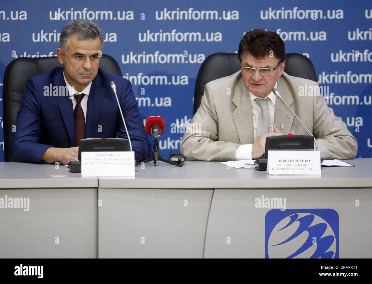Head of the State Space Agency of Ukraine Yuri Radchenko (R) and Acting Head of the State Export Control Service of Ukraine Igor Savula (L) speak to journalists during a press coference in Kiev, Ukraine on August 15, 2017. Ukraine's space agency said today that an engine type reportedly used in North Korean missiles was made at a Ukrainian factory, but solely for use in space rockets supplied to Russia. (Photo by STR/NurPhoto) Stock Photo