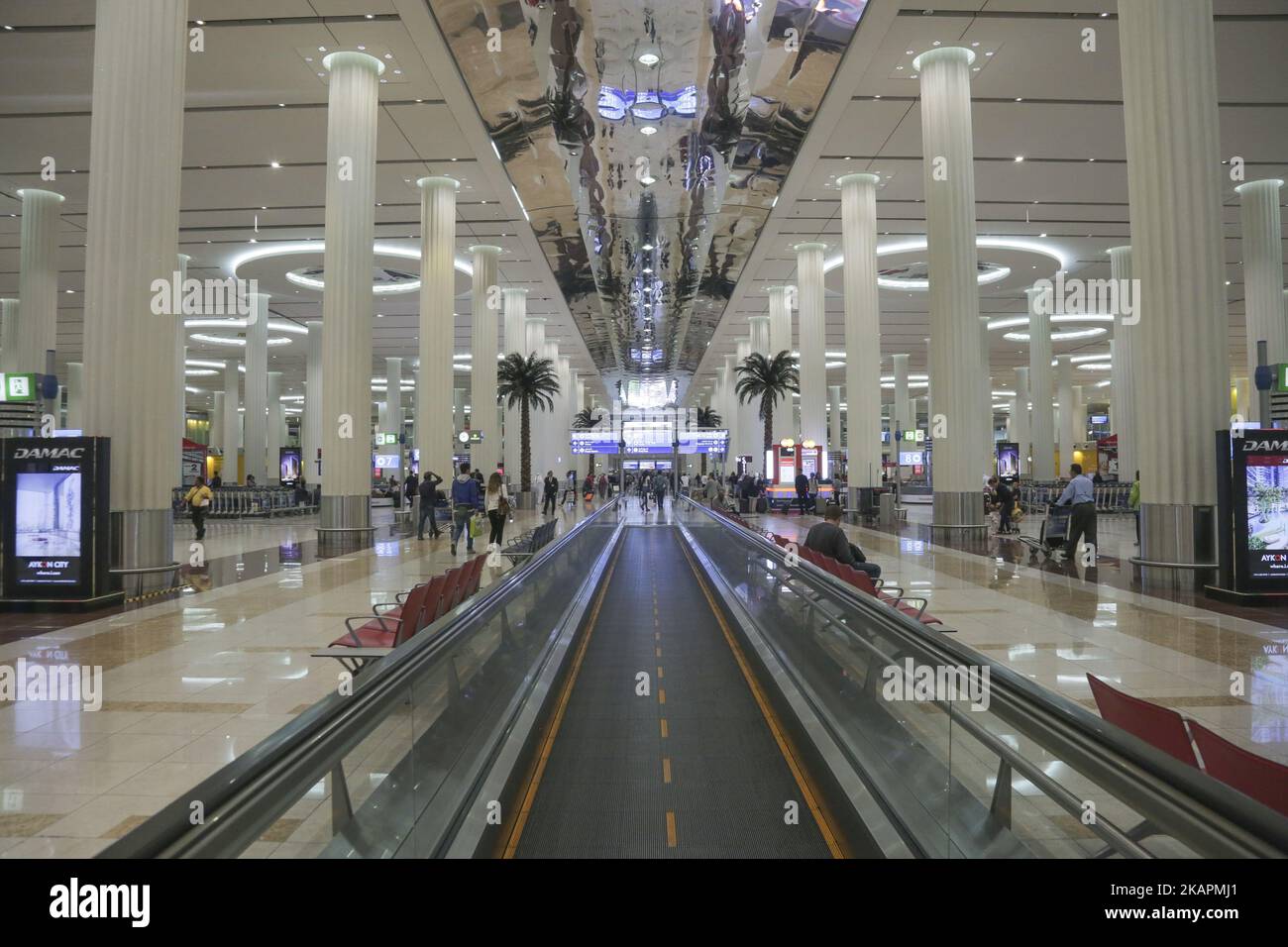 A picture taken on August 21, 2017 in the airport of Dunbai, UAE. Dubai International Airport, the largest airport in space in the world and busiest airport by international passenger traffic. It is also the 3rd busiest airport in the world by total passenger traffic. About 84.000.000 million passengers passed in 2016 from DXB. Emirates and Fludubai are the primary users of the airport, connecting Middle East to all over the world. Also FedEx Express and Qantas uses the airport as a hub. (Photo by Nicolas Economou/NurPhoto) Stock Photo