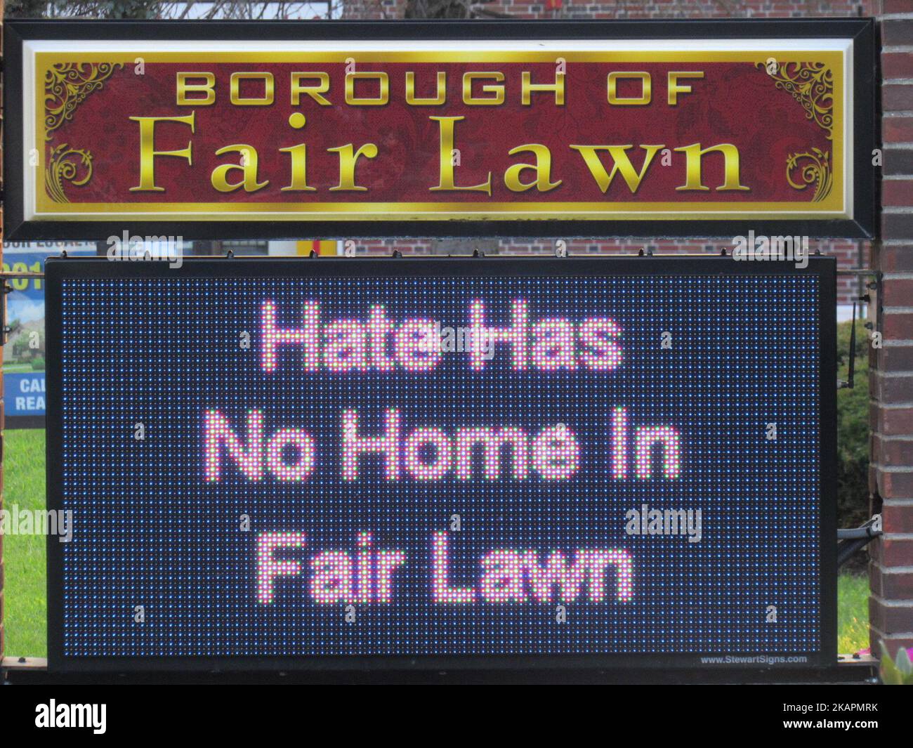 Borough of Fair Lawn sign reading 'Hate Has No Home in Fair Lawn' during a Rally for Unity and Peace with Mayor, Councilwoman, full Borough Council and religious leaders in Fair Lawn, NJ on August 20, 2017. (Photo by Kyle Mazza/NurPhoto) Stock Photo