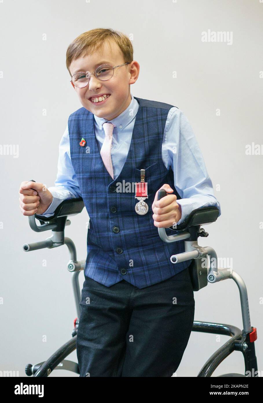 The youngest-ever honours recipient, fundraiser 'Captain' Tobias Weller, 11, is presented with his British Empire Medal (BEM) by the Countess of Wessex at his school in Sheffield. Picture date: Thursday November 3, 2022. Stock Photo