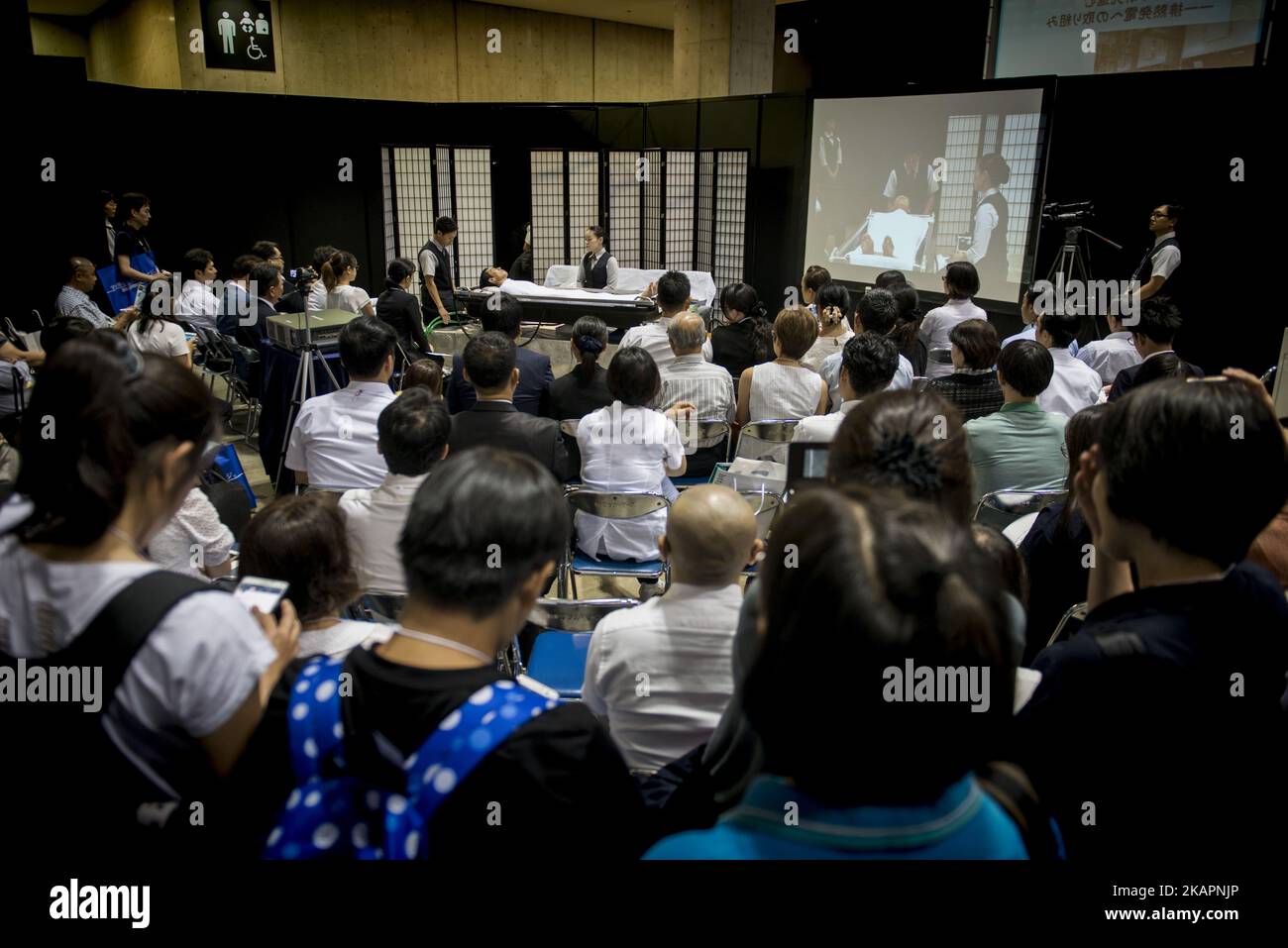 Demonstration of the deceased's body wash to the Tokyo Int'l Funeral & Cemetery Show in Tokyo, Japan on August 23, 2017. Hundreds of funeral home operators, cemeteries operators, crematorium operators, traders, suppliers, buyers, professional associations and investors gather at this professional funeral event.(Photo by Alessandro Di Ciommo/NurPhoto) Stock Photo