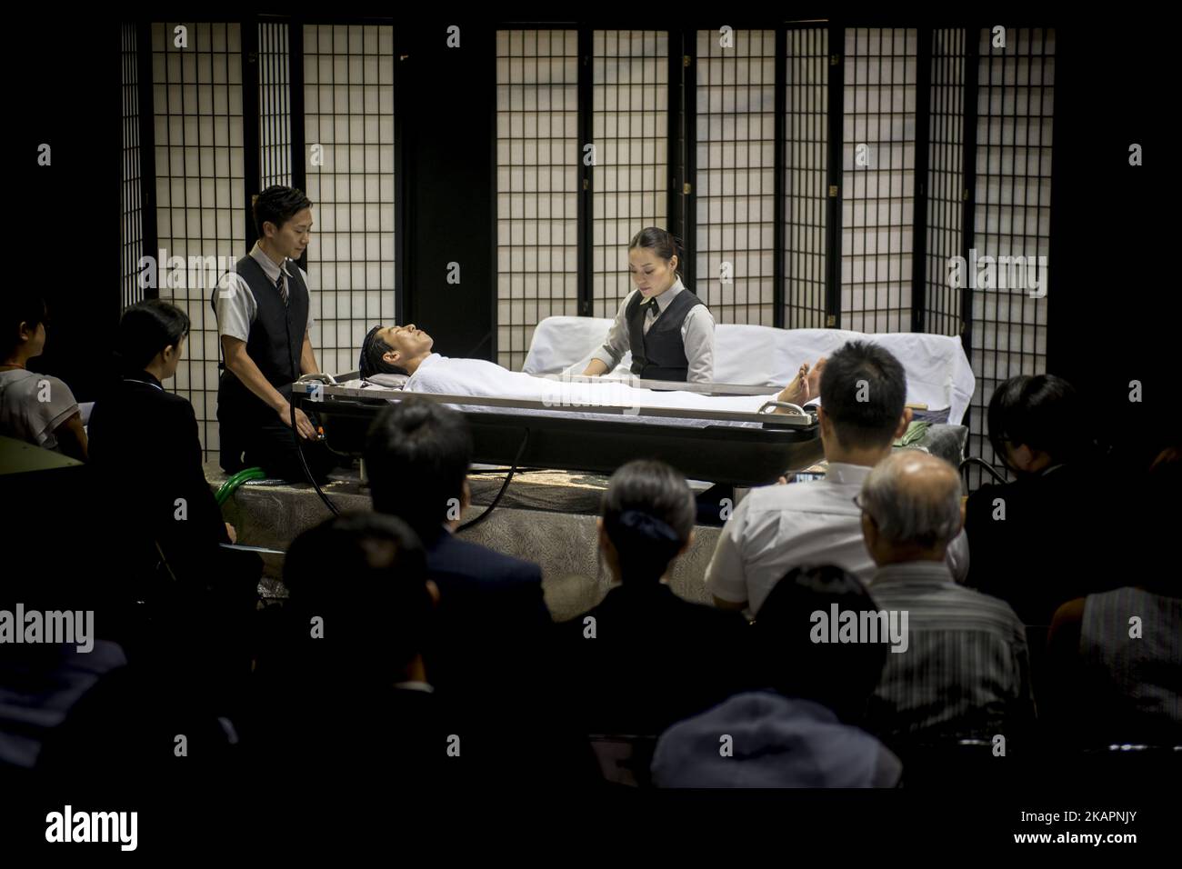 Demonstration of the deceased's body wash to the Tokyo Int'l Funeral & Cemetery Show in Tokyo, Japan on August 23, 2017. Hundreds of funeral home operators, cemeteries operators, crematorium operators, traders, suppliers, buyers, professional associations and investors gather at this professional funeral event.(Photo by Alessandro Di Ciommo/NurPhoto) Stock Photo