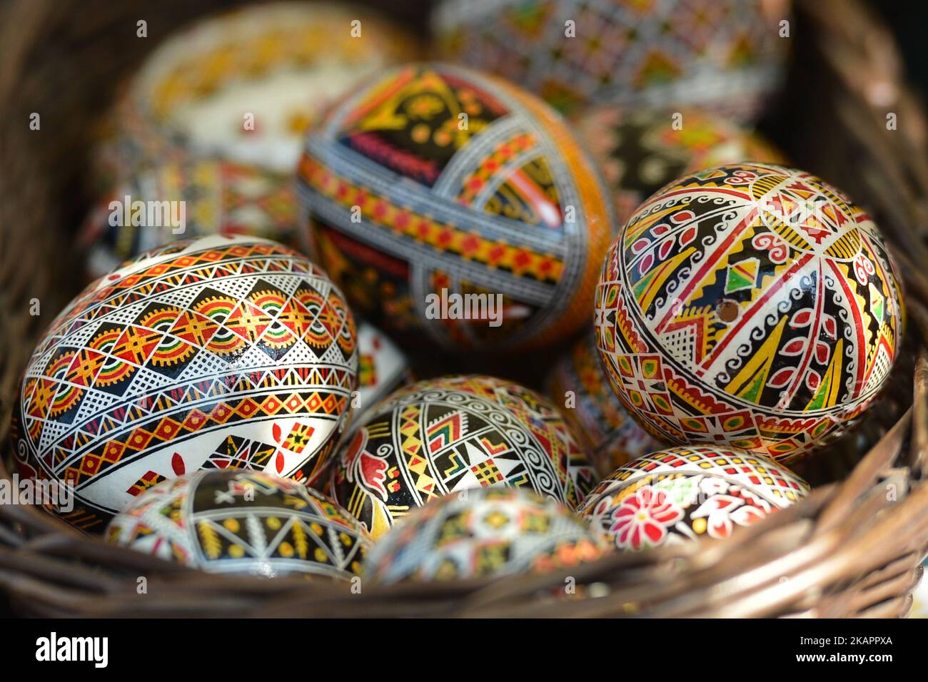 Traditional hand decorated 'Pisanki' (Easter Eggs) made in Ukraine on display for sale during 'Ukrainian Day' at the 41st International Folk Art and Craft Fair in Krakow's Main Market Square. On Thursday, August 24, 2017, in Krakow, Poland. (Photo by Artur Widak/NurPhoto)  Stock Photo