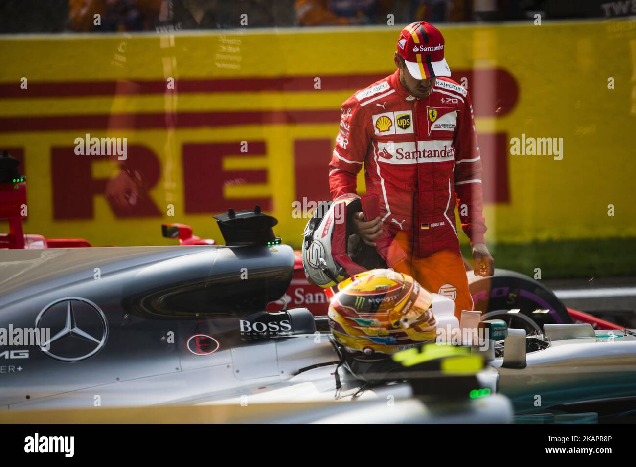 05 VETTEL Sebastian from Germany of scuderia Ferrari inspecting the Mercedes of Lewis Hamilton during the Qualifying of Formula One Belgian Grand Prix at Circuit de Spa-Francorchamps on August 25, 2017 in Spa, Belgium. (Photo by Xavier Bonilla/NurPhoto) Stock Photo