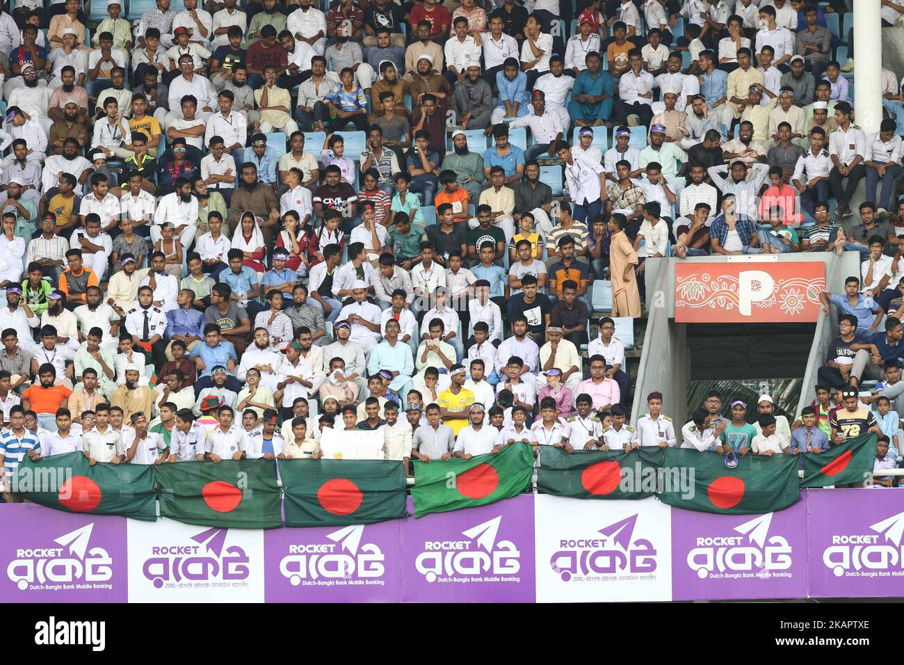 Fans cheer during day three of the First Test match between Bangladesh