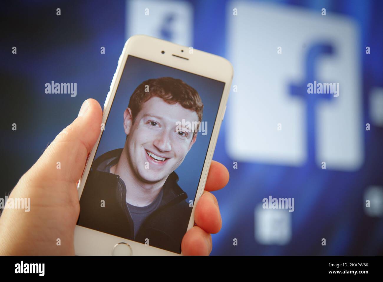 A portrait of Facebook found Mark Zuckerberg is seen on an iPhone in this photo illustration on 28 August, 2017. (Photo by Jaap Arriens/NurPhoto) Stock Photo