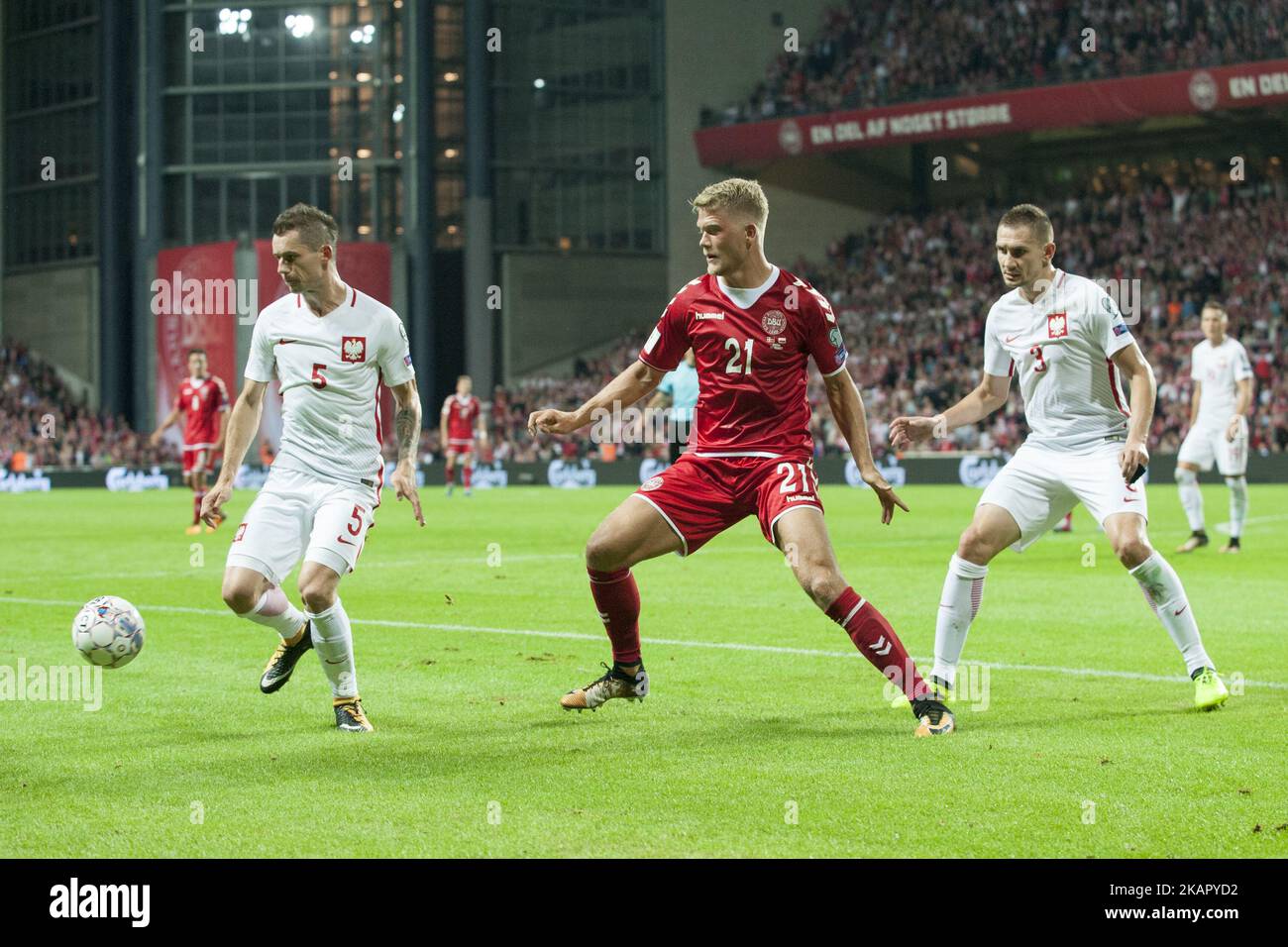 Krzysztof Maczynski (5) and Artur Jedrzejczyk (3) fight for the ball with Andreas Cornelius of Denmark during the FIFA World Cup 2018 Qualifying Round between Denmark and Poland at Telia Parken Stadium in Copenhagen, Denmark on September 1, 2017 (Photo by Andrew Surma/NurPhoto) Stock Photo