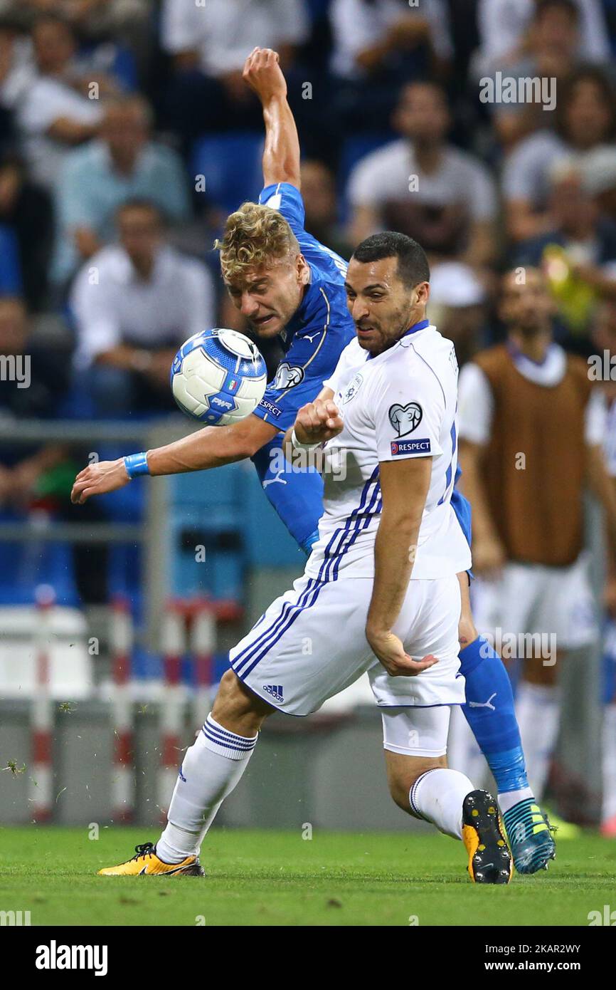 Ciro Immobile of Italy tackled by Tal Ben Haim of Israel during FIFA World Cup Qualifier Group G match between Italy and Israel at Mapei Stadium in Reggio Emilia, Italy on September 5, 2017. (Photo by Matteo Ciambelli/NurPhoto) Stock Photo