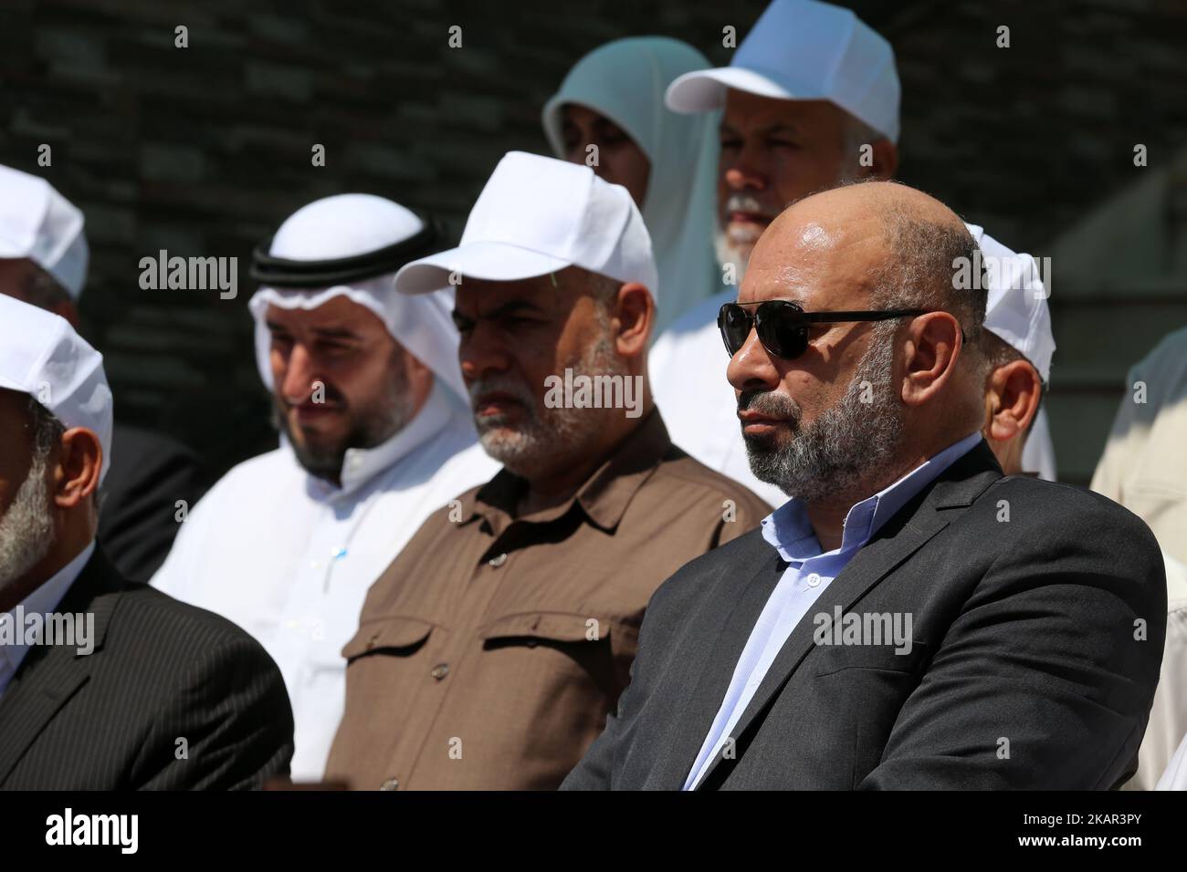 The Palestinian parliament members stand in solidarity with the Muslims